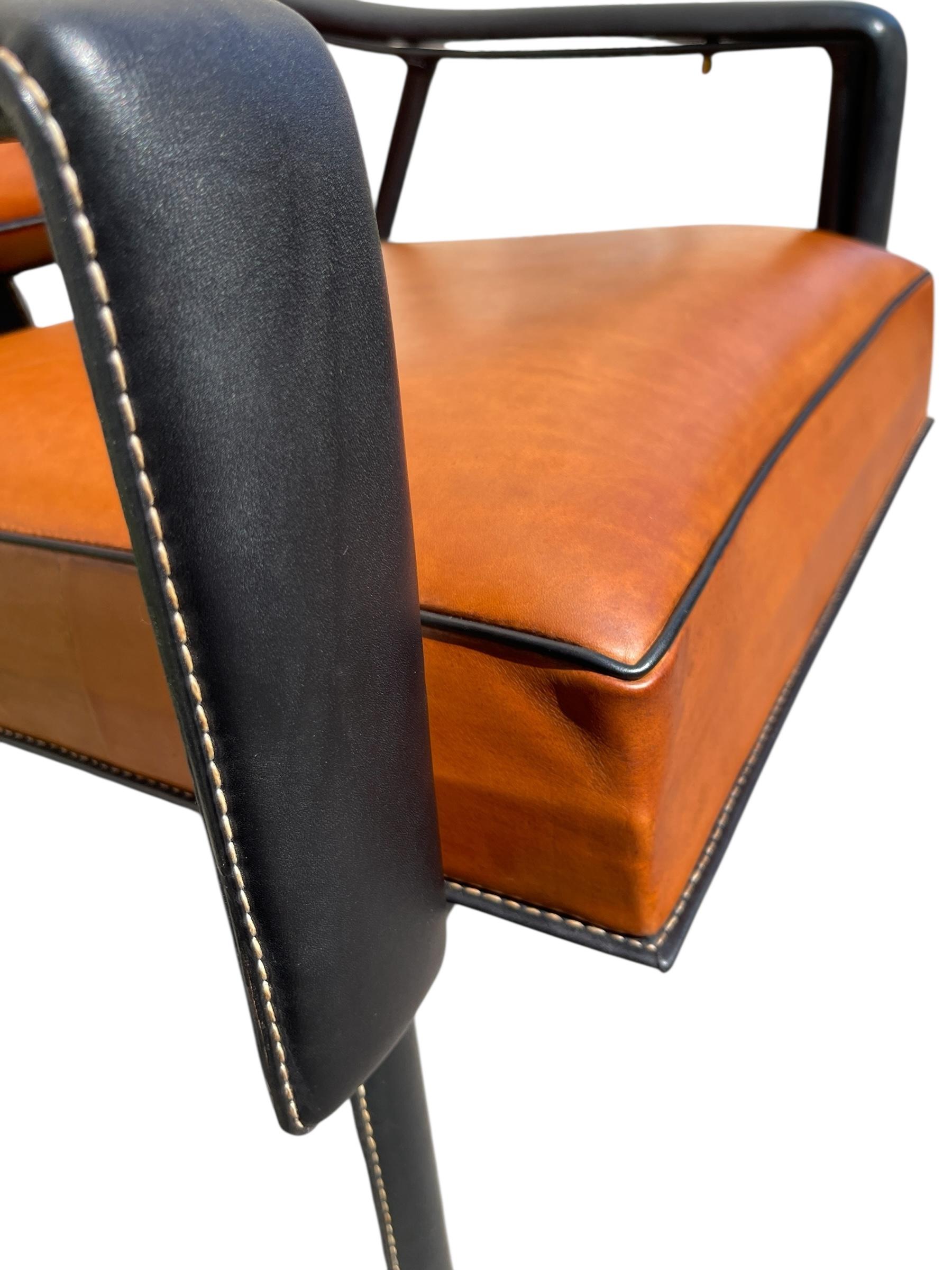 French 1950's Stitched leather armchair by Jacques Adnet For Sale