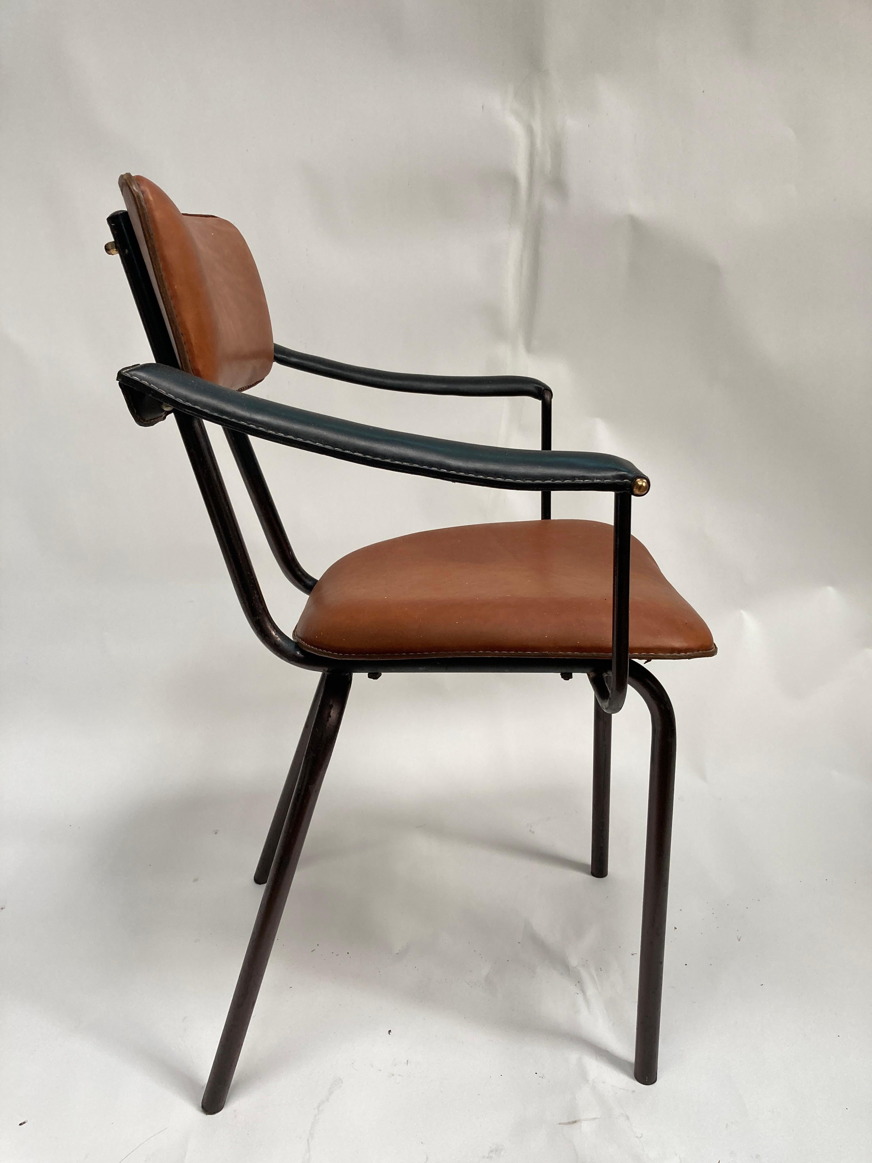 Metal 1950's Stitched leather armchair by Jacques Adnet  For Sale