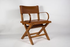 Sillones de cuero cosido de los años 50 por Jacques Adnet