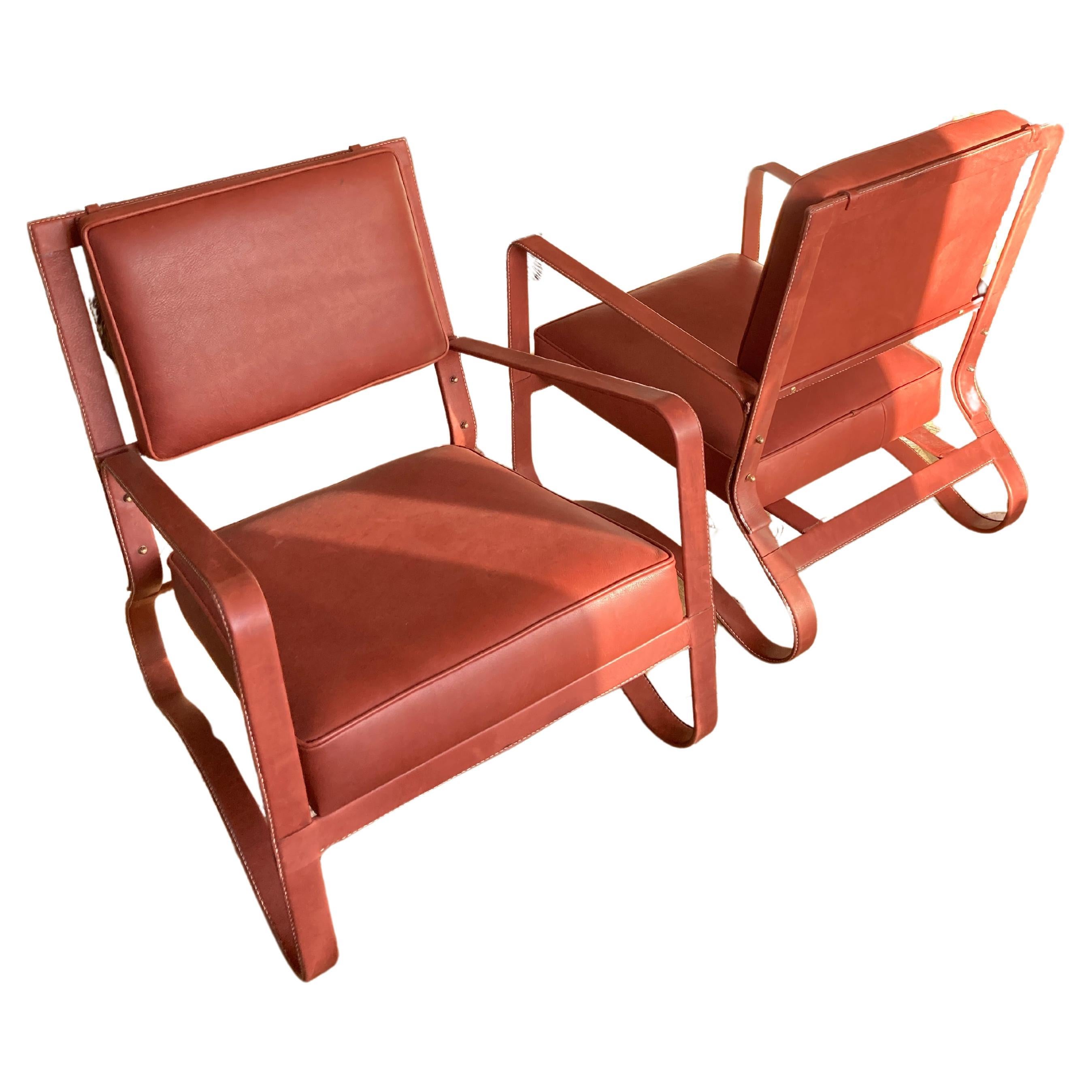 1950's Stitched leather armchairs by Jacques Adnet  For Sale