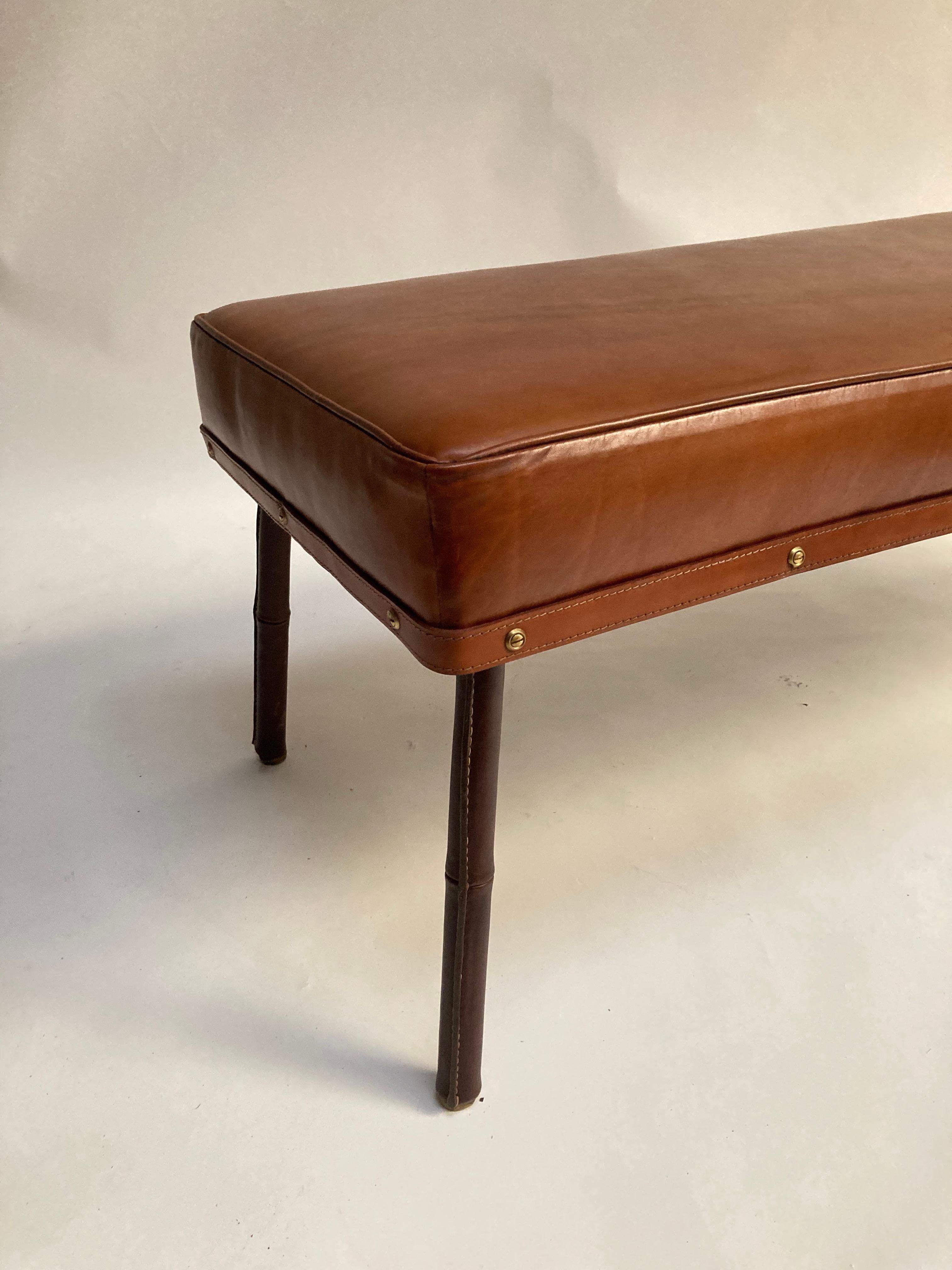 Very nice stitched leather bench by Jacques Adnet.
This piece is quiet rare.
France.
1950's.