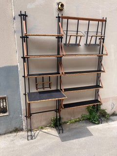 1950's Stitched leather bookcase and desk by Jacques Adnet