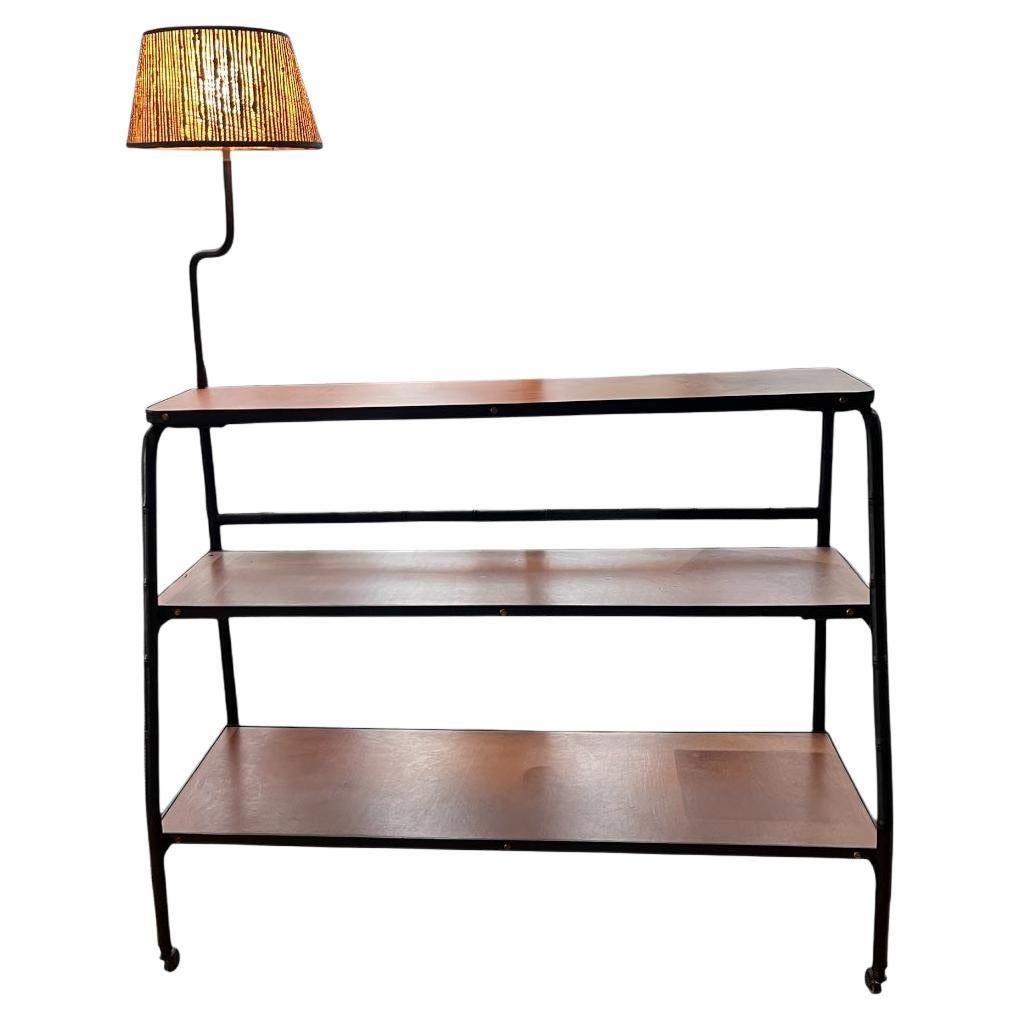 1950
s Stitched leather bookcase by Jacques Adnet For Sale