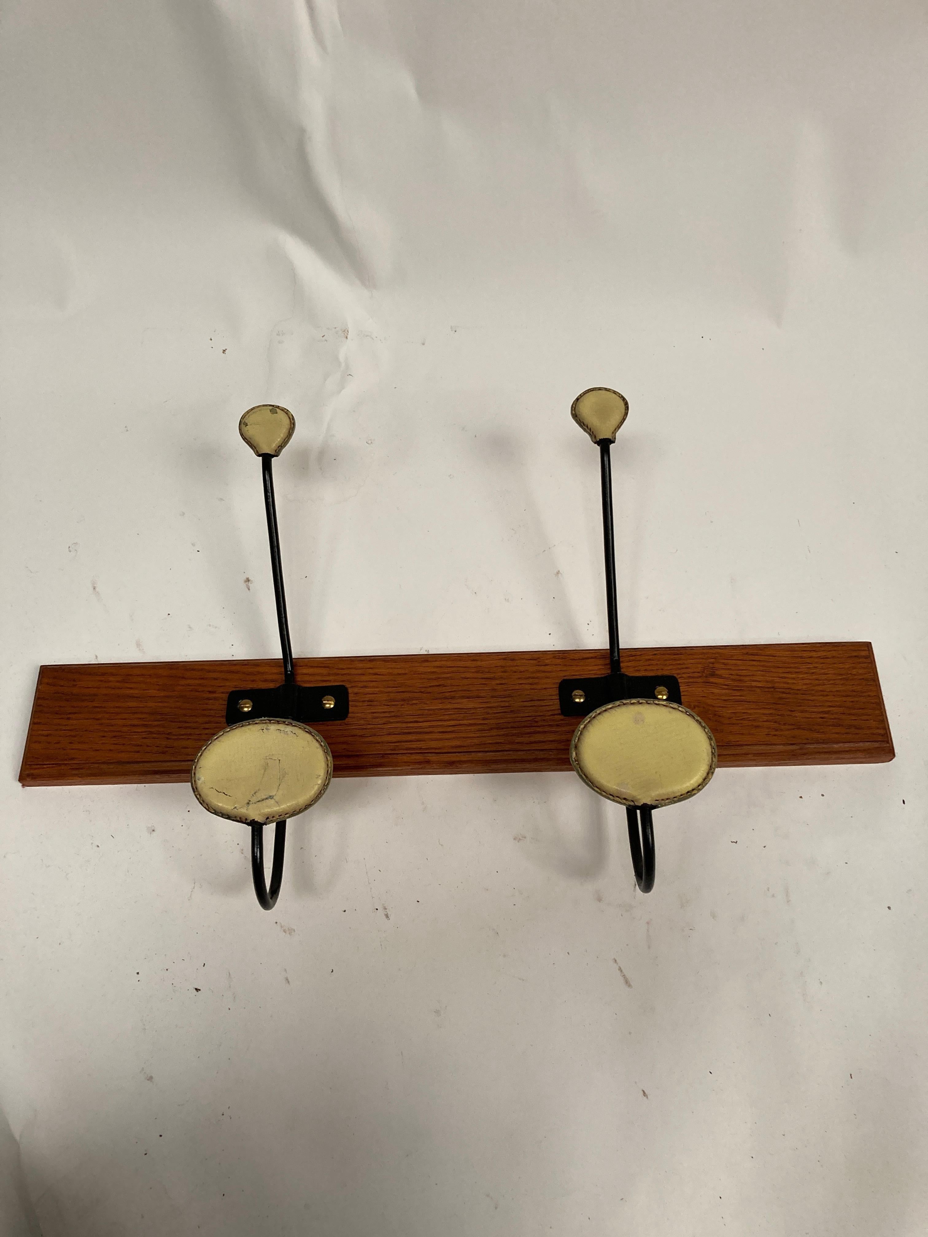 European 1950's Stitched leather coat rack by Jacques Adnet For Sale