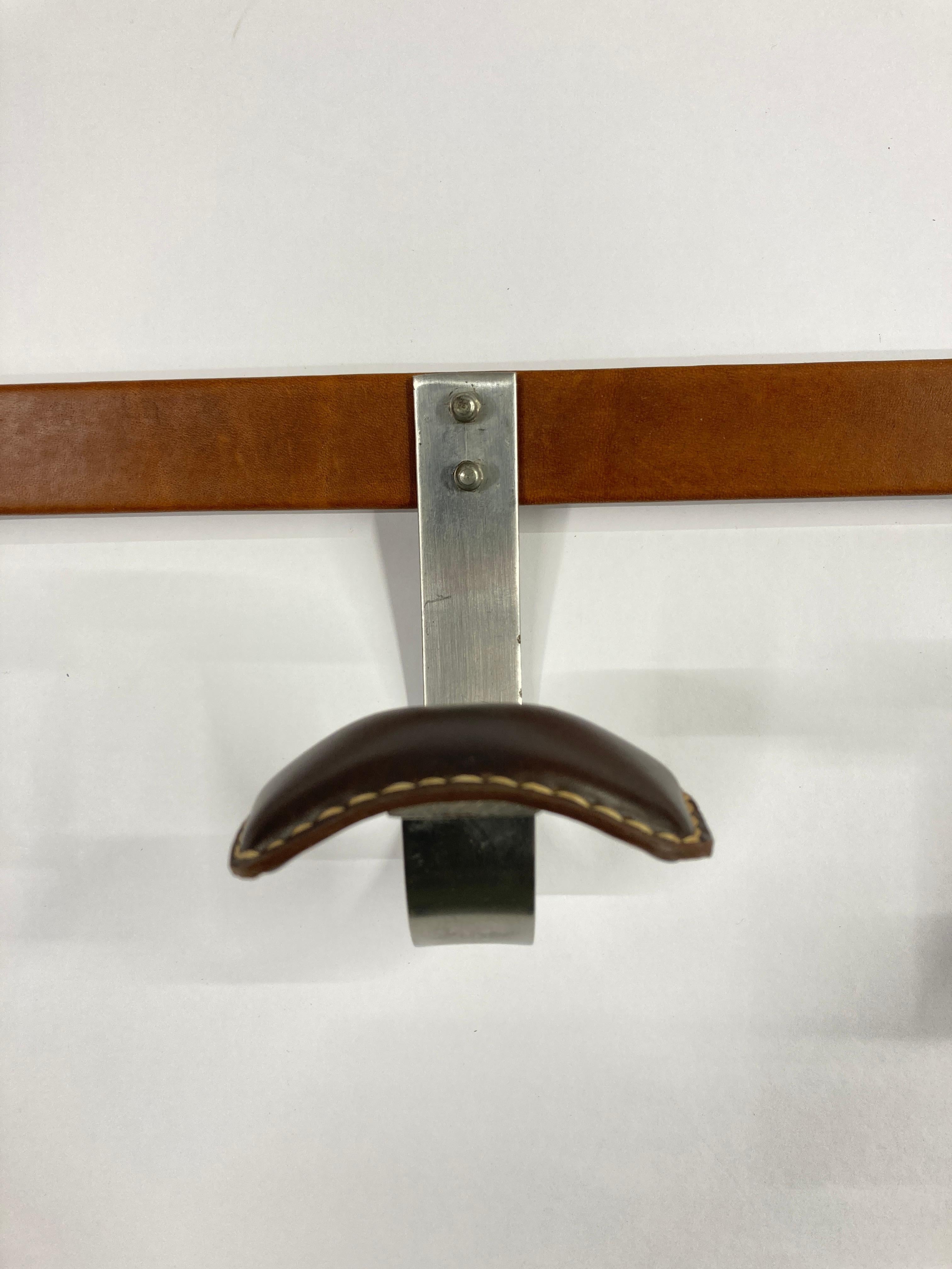 French 1950's Stitched Leather coat rack by Jacques Adnet For Sale