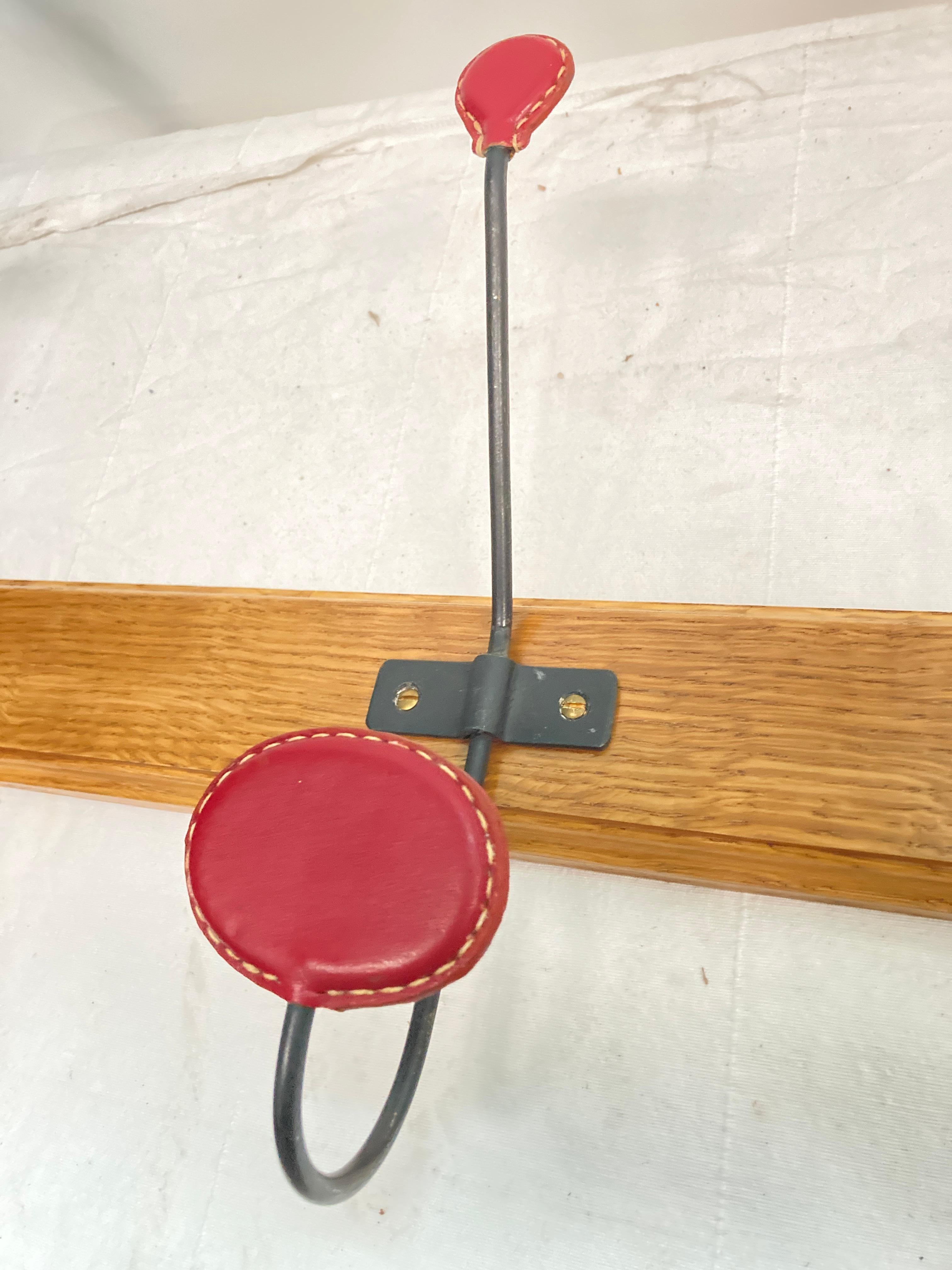 Mid-20th Century 1950's Stitched leather coat rack by Jacques Adnet For Sale