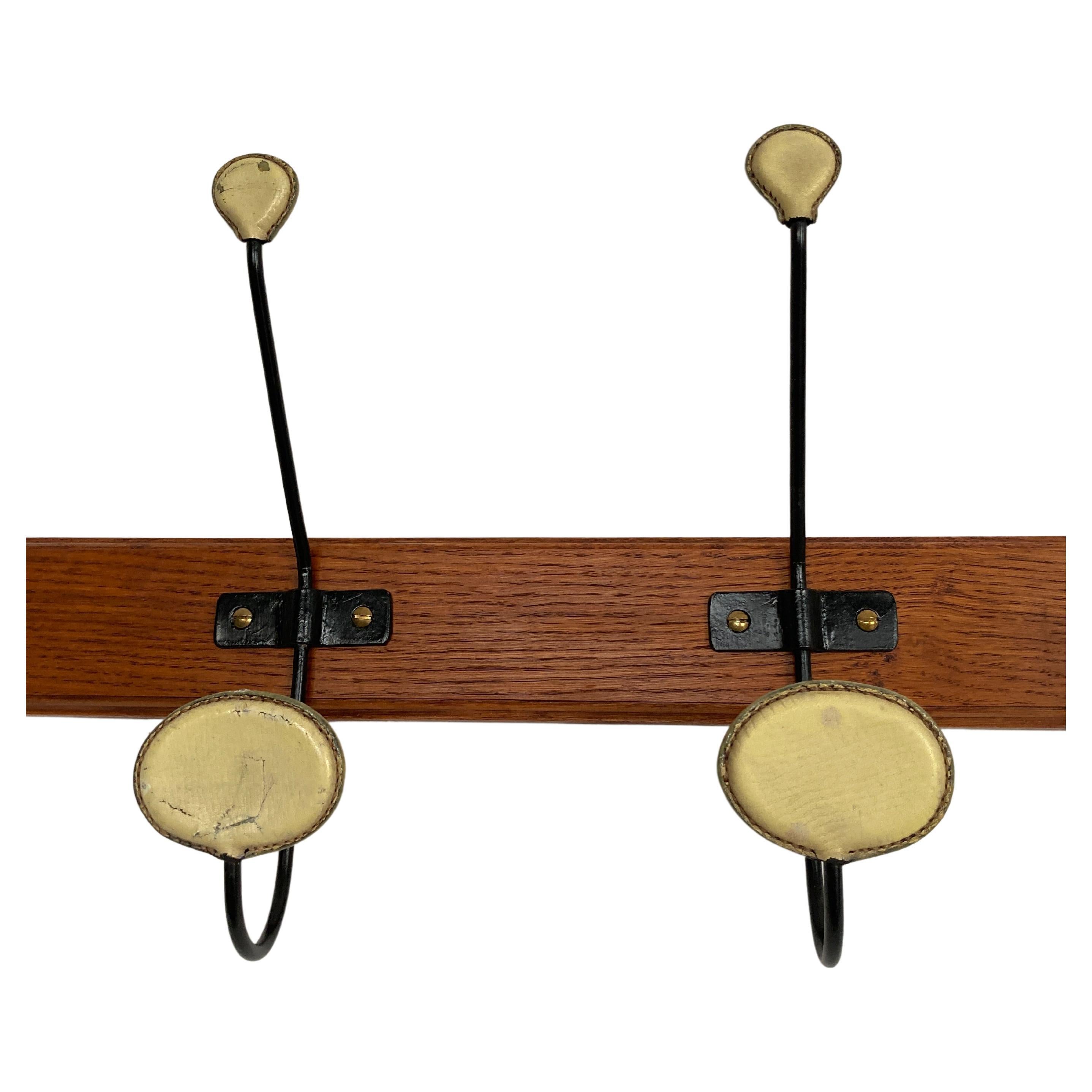 1950's Stitched leather coat rack by Jacques Adnet For Sale