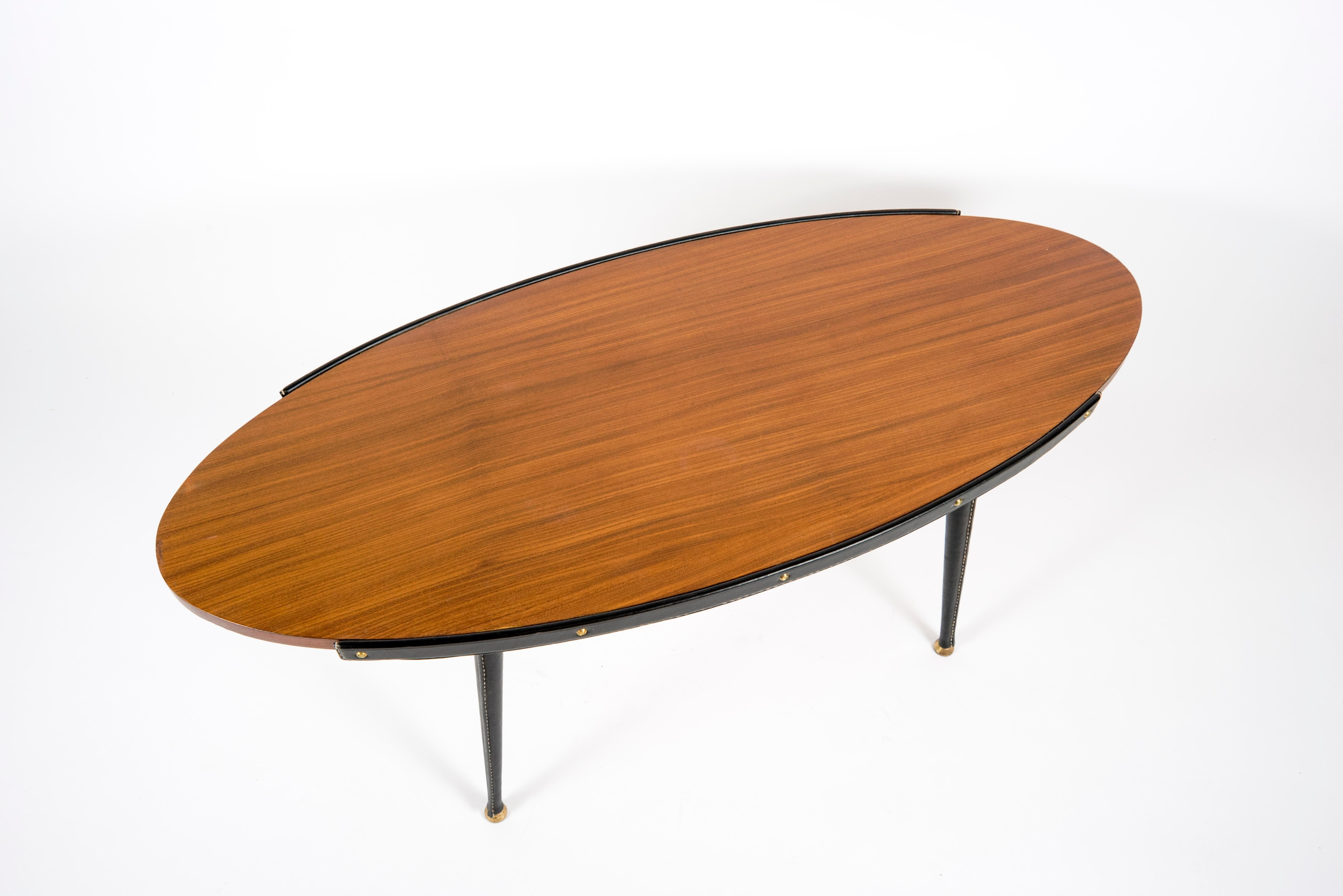 1950's stitched leather cocktail table by Jacques Adnet
France.