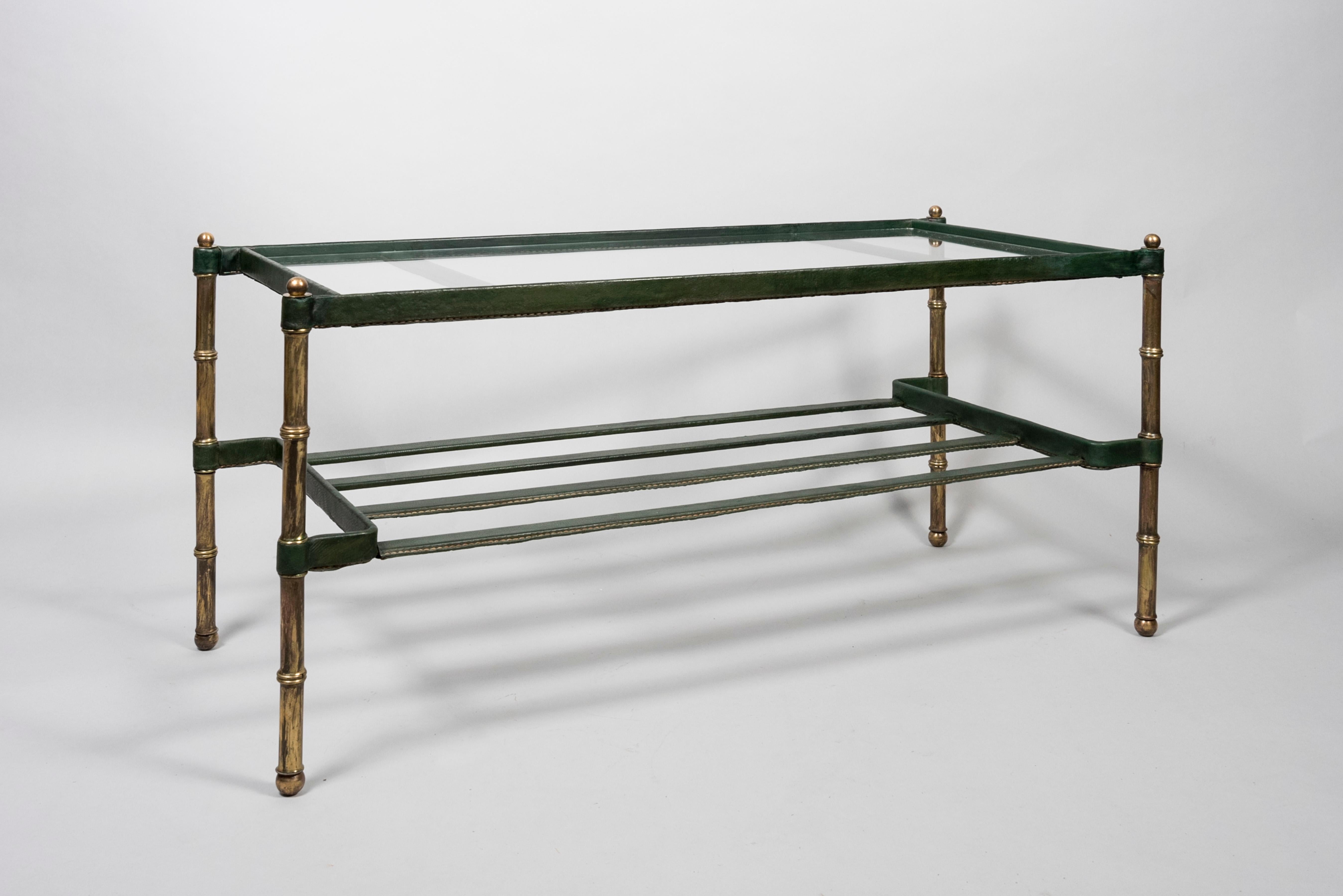 1950's Stitched green leather cocktail table by Jacques Adnet
Good overall condition.