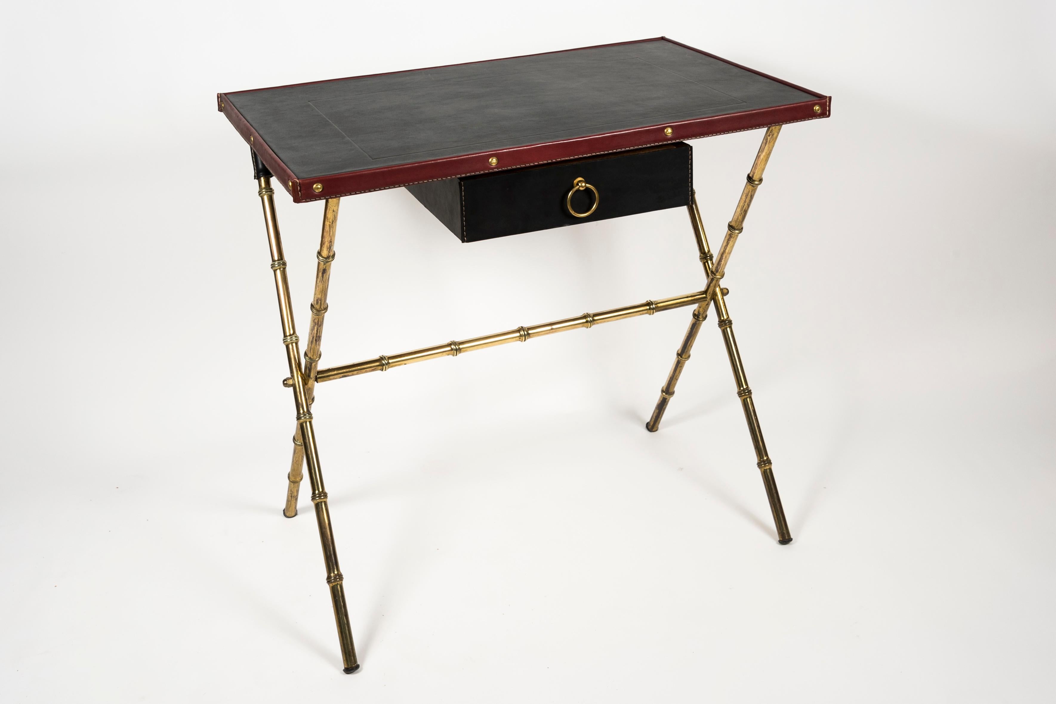 1950s Stitched leather desk with his stool.
All set designed by Jacques Adnet.