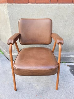 Sillón de escritorio de cuero cosido de los años 50, por Jacques Adnet