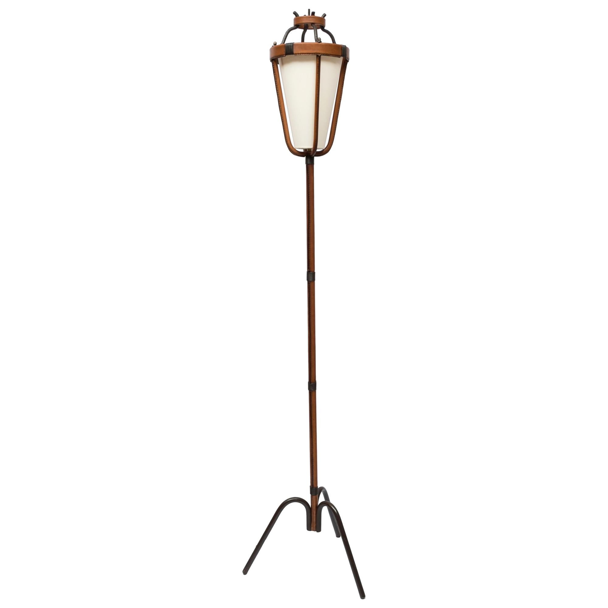 1950s stitched leather floor lamp by Jacques Adnet,
France.