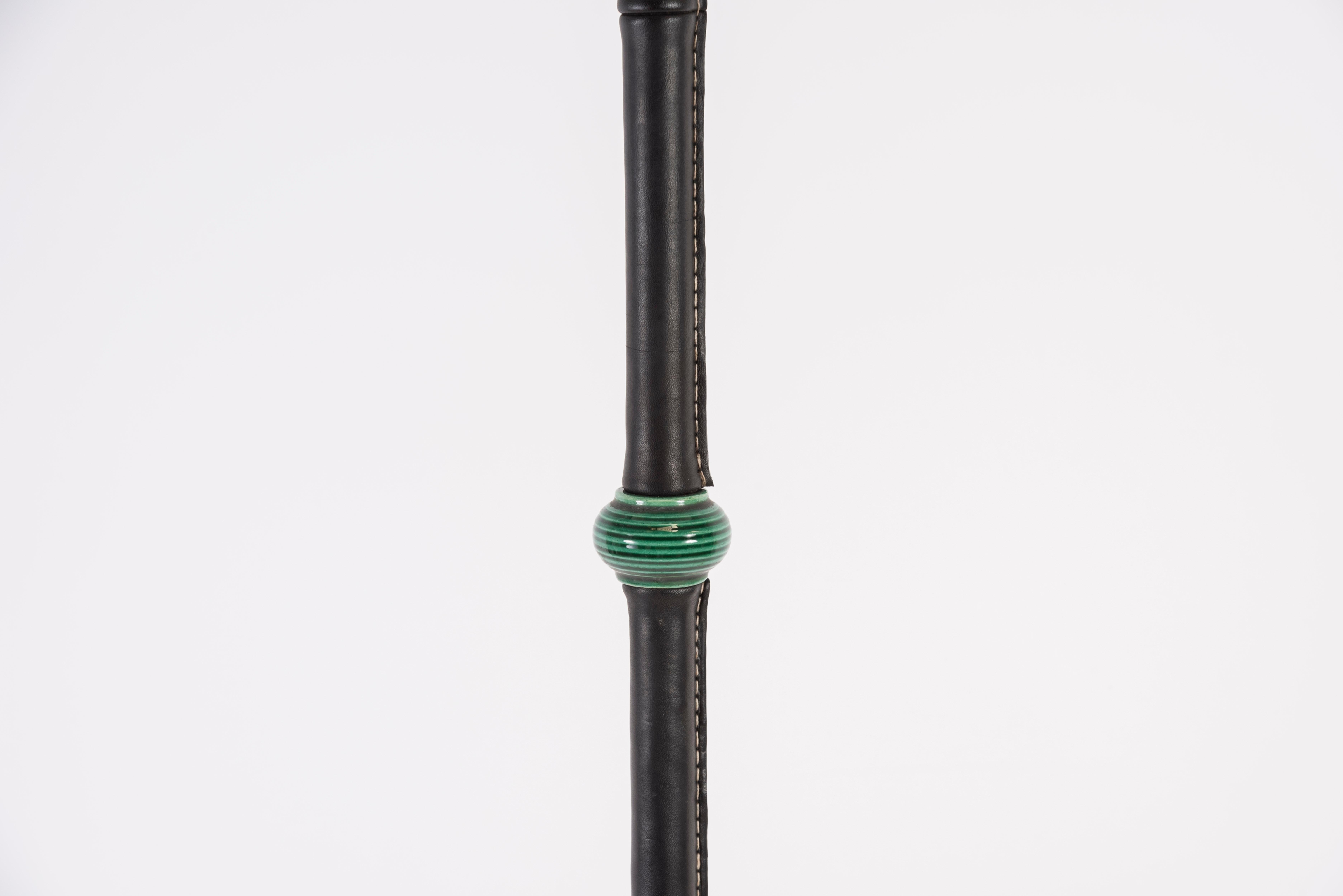 1950's stitched leather floor lamp by Jacques Adnet
With green Ceramic By Maurice Savin
France.