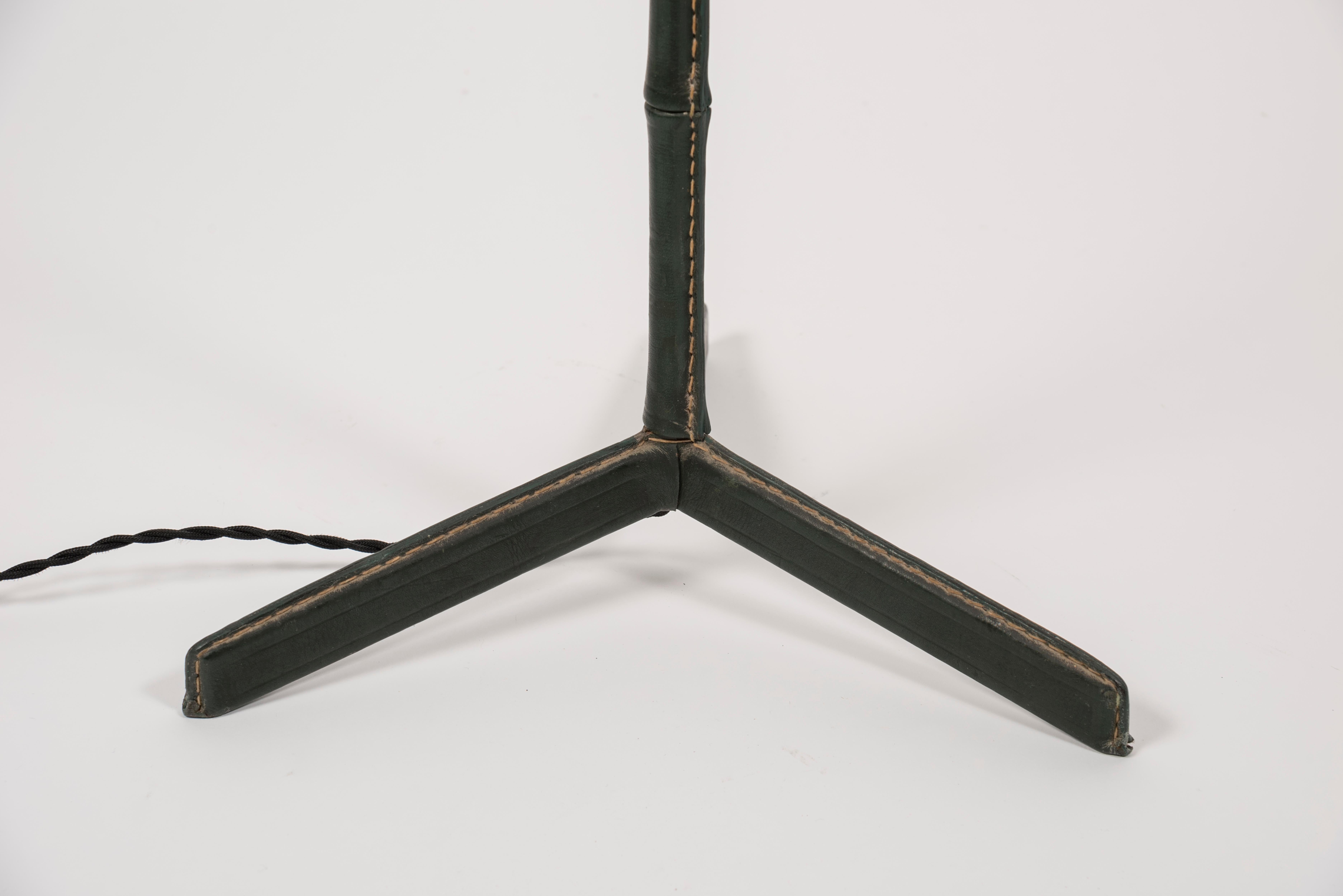 1950's Dark green stitched leather floor lamp By Jacques Adnet.
No shade provided
Shade not included
France.