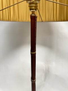 1950's Stitched leather Floor lamp By Jacques adnet