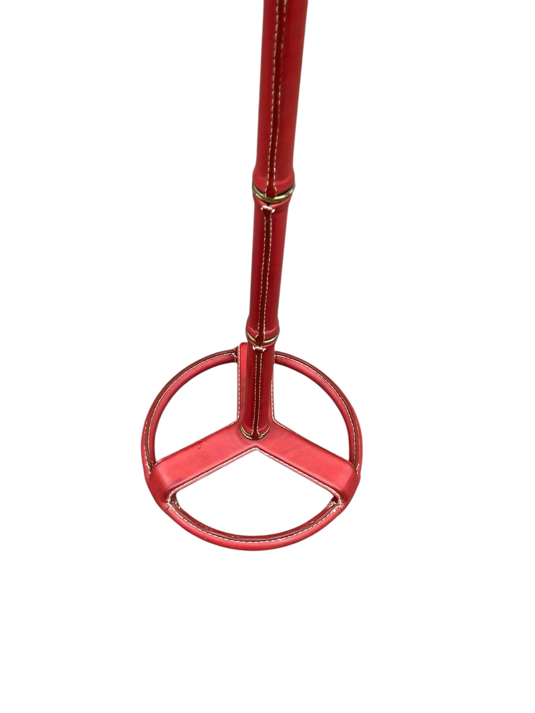 Rare red Stitched leather floor lamp by Jacques Adnet
France
1950's
Dimensions given without shade / No shade included