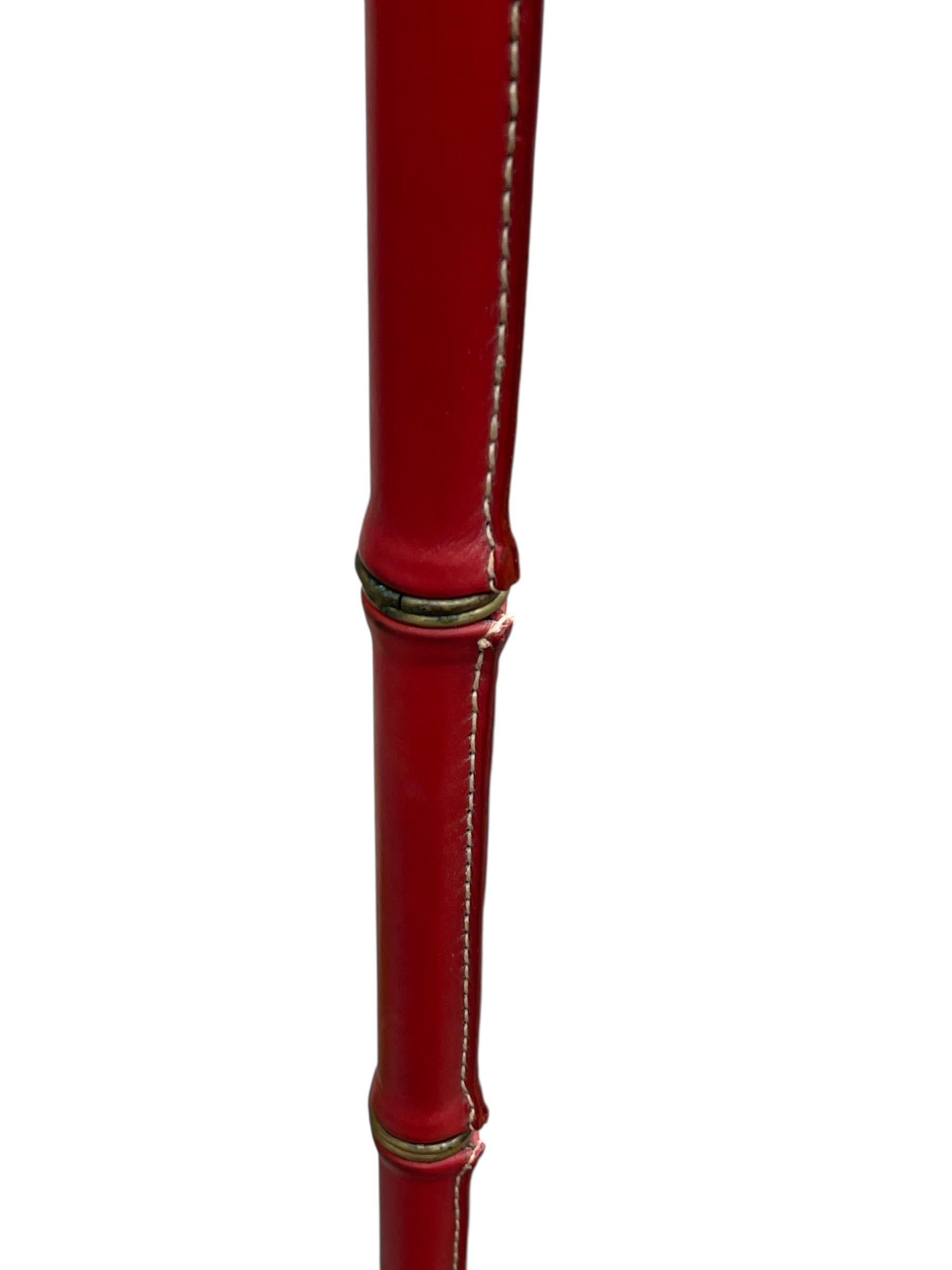 Metà XX secolo 1950's Stitched leather floor lamp by Jacques Adnet in vendita