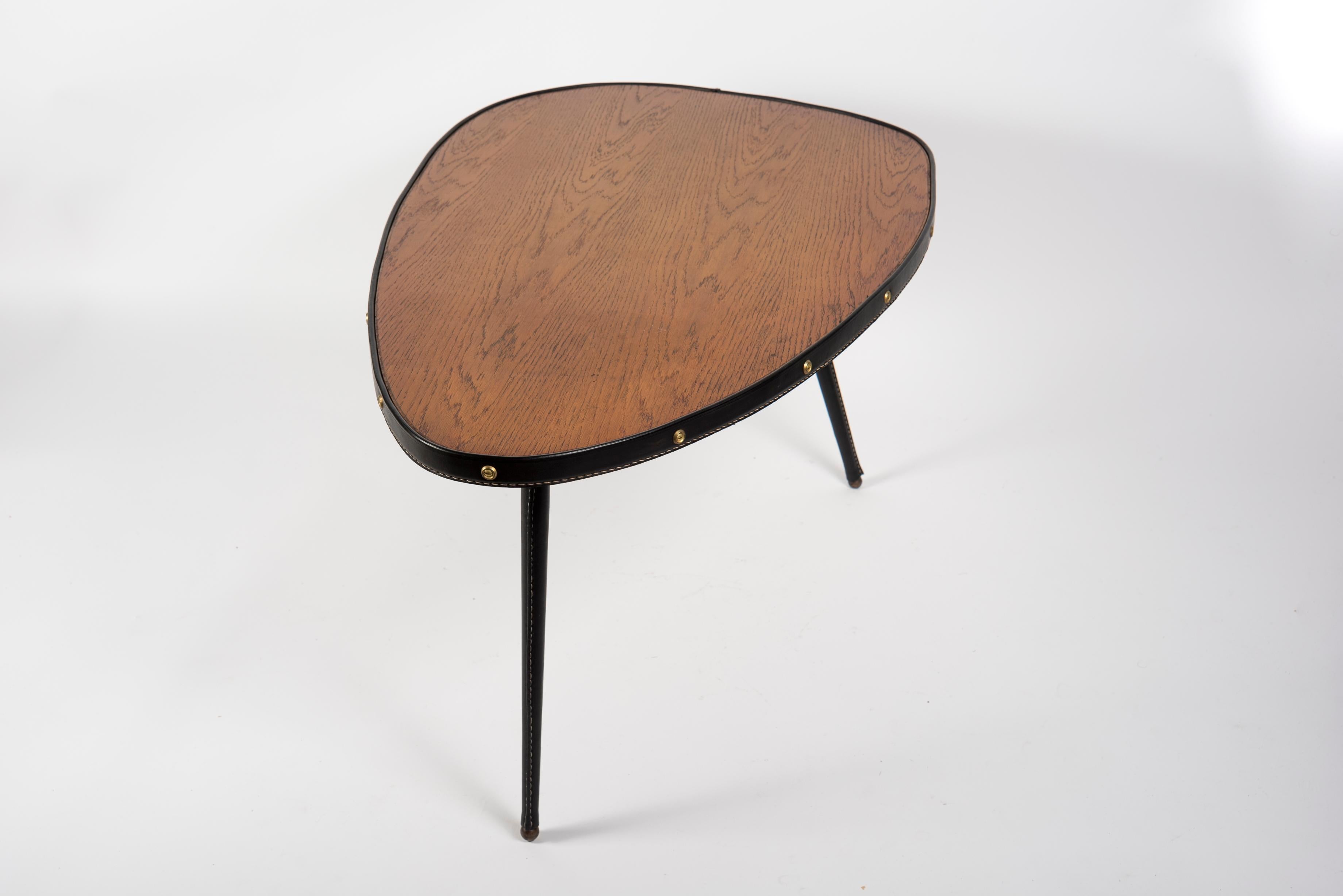 1950's Stitched leather free form cocktail table by Jacques Adnet For Sale 1