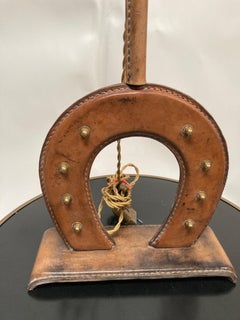 1950's Stitched leather Horse shoe lamp By Jacques Adnet