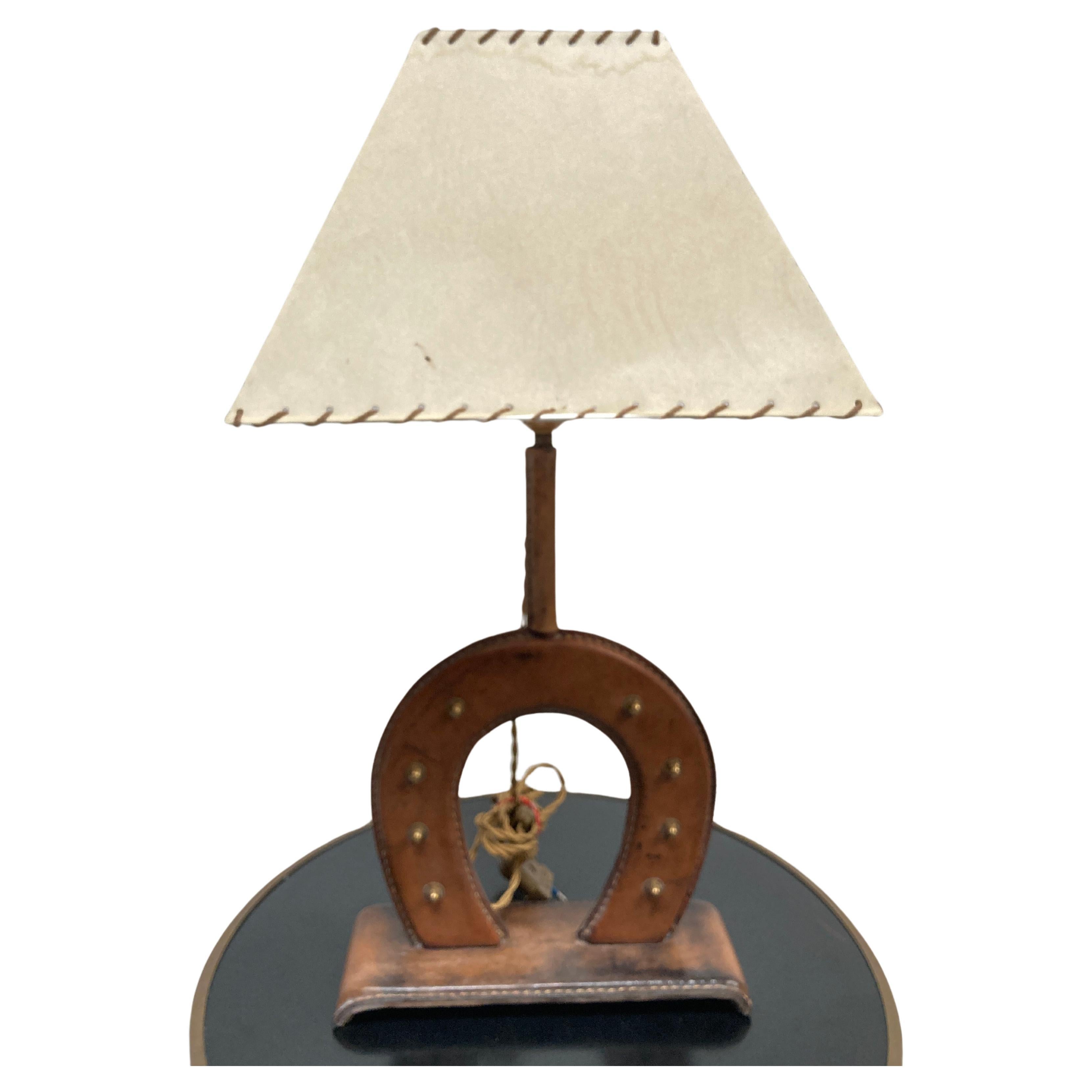 1950's Stitched leather Horse shoe lamp By Jacques Adnet For Sale