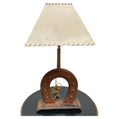 1950's Stitched leather Horse shoe lamp By Jacques Adnet