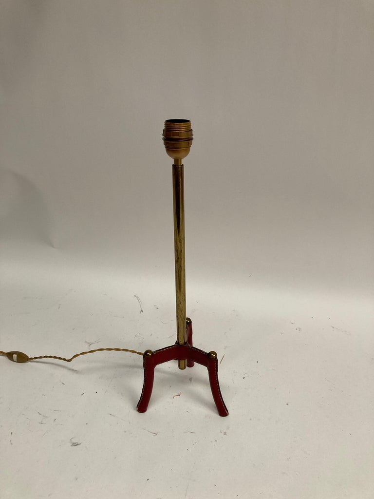 1950's Stitched leather Lamp by Jacques Adnet
Brass and leather
Very good vintage condition
Dimensions given without shade
No shade included
France.