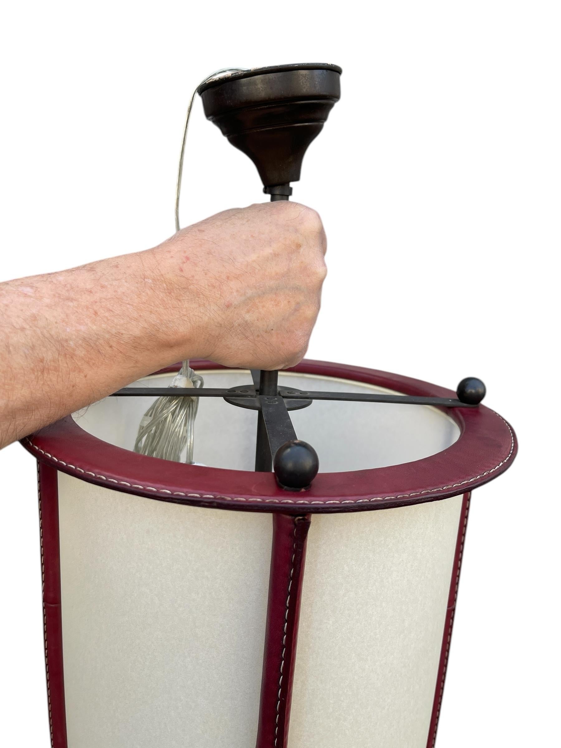 Leather 1950's Stitched leather lantern by Jacques Adnet For Sale
