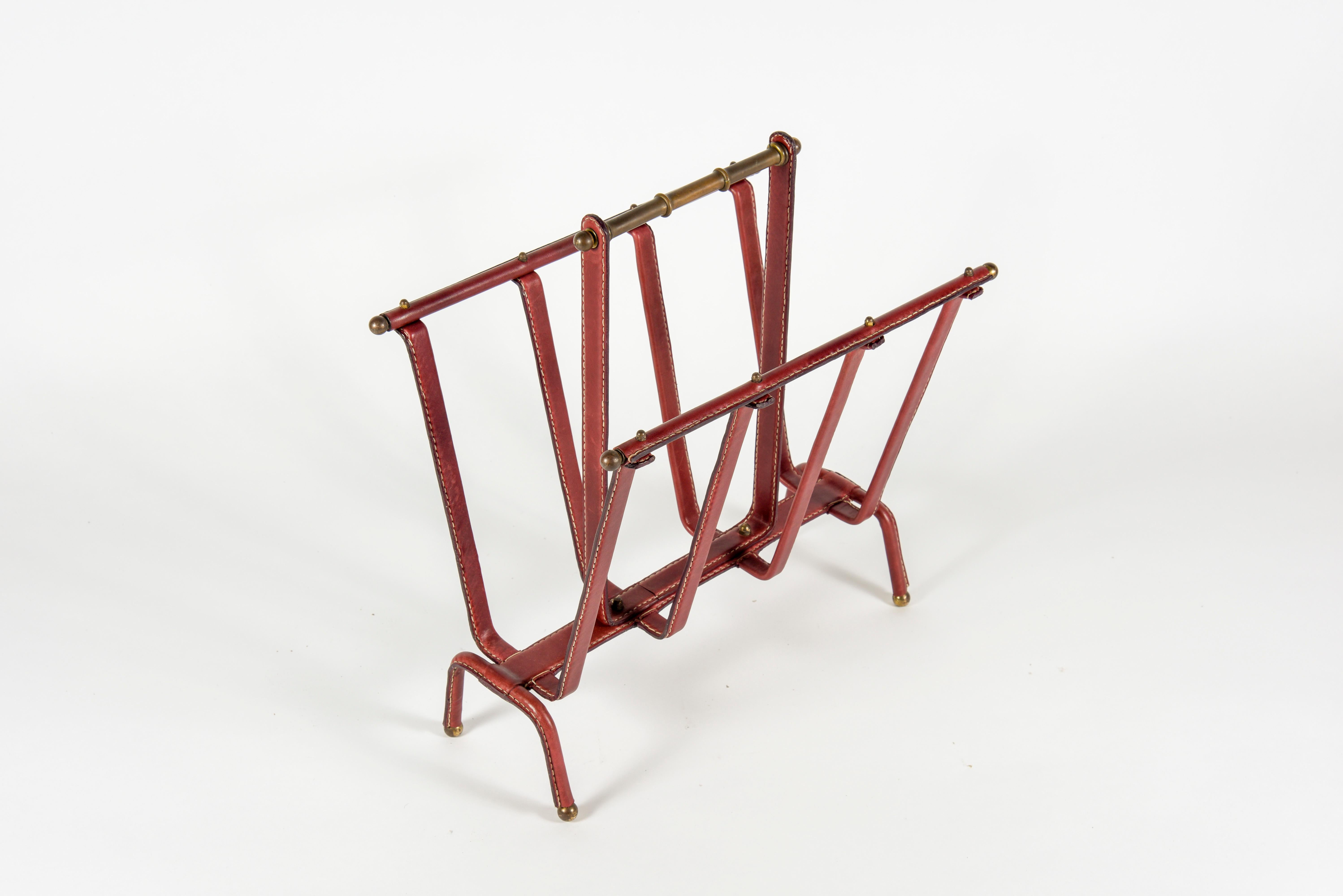 Very rare stitched leather magazine rack designed by Jacques Adnet
Very good condition
rare color
1950s
France.