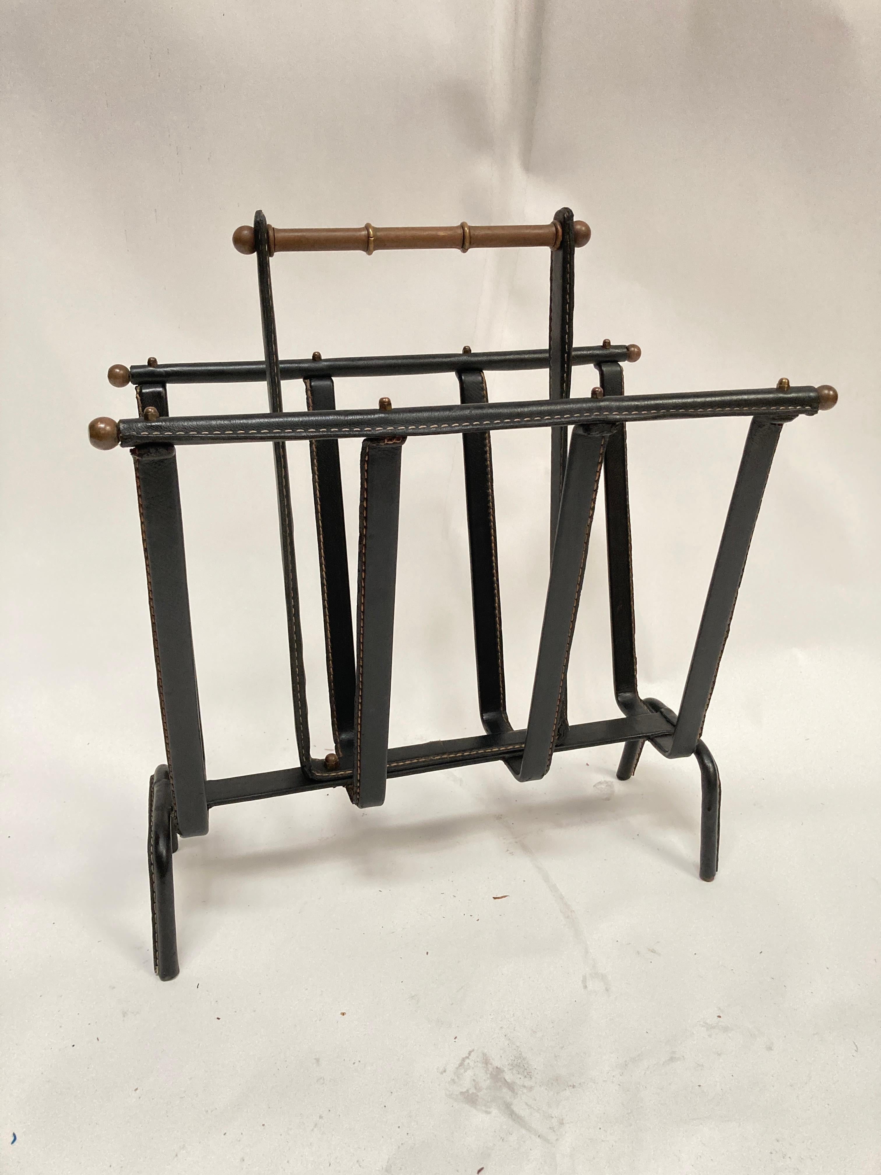 1950's Stitched leather magazines rack by Jacques Adnet
1950's
France