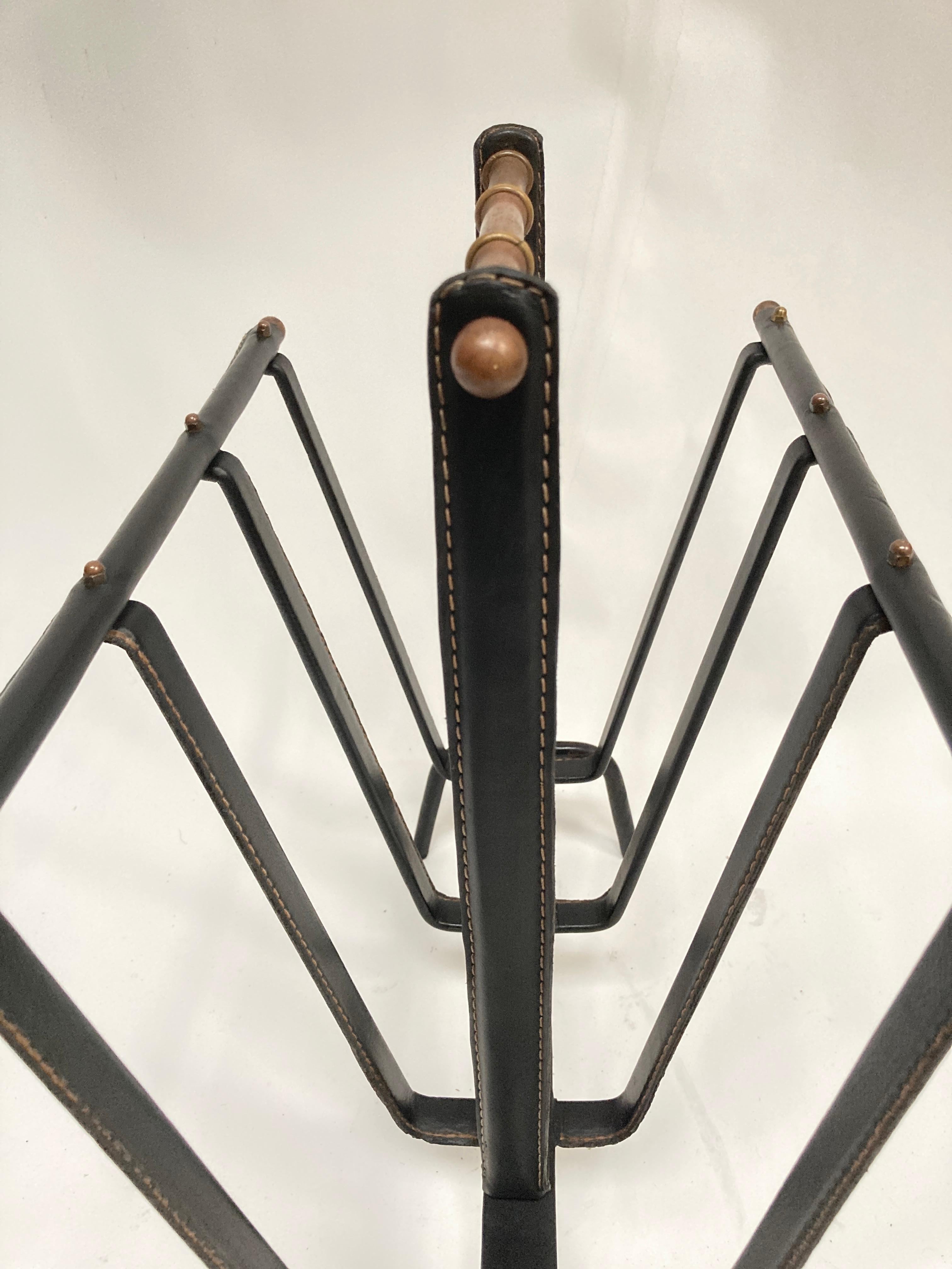 Leather 1950's stitched leather magazine rack by Jacques Adnet For Sale