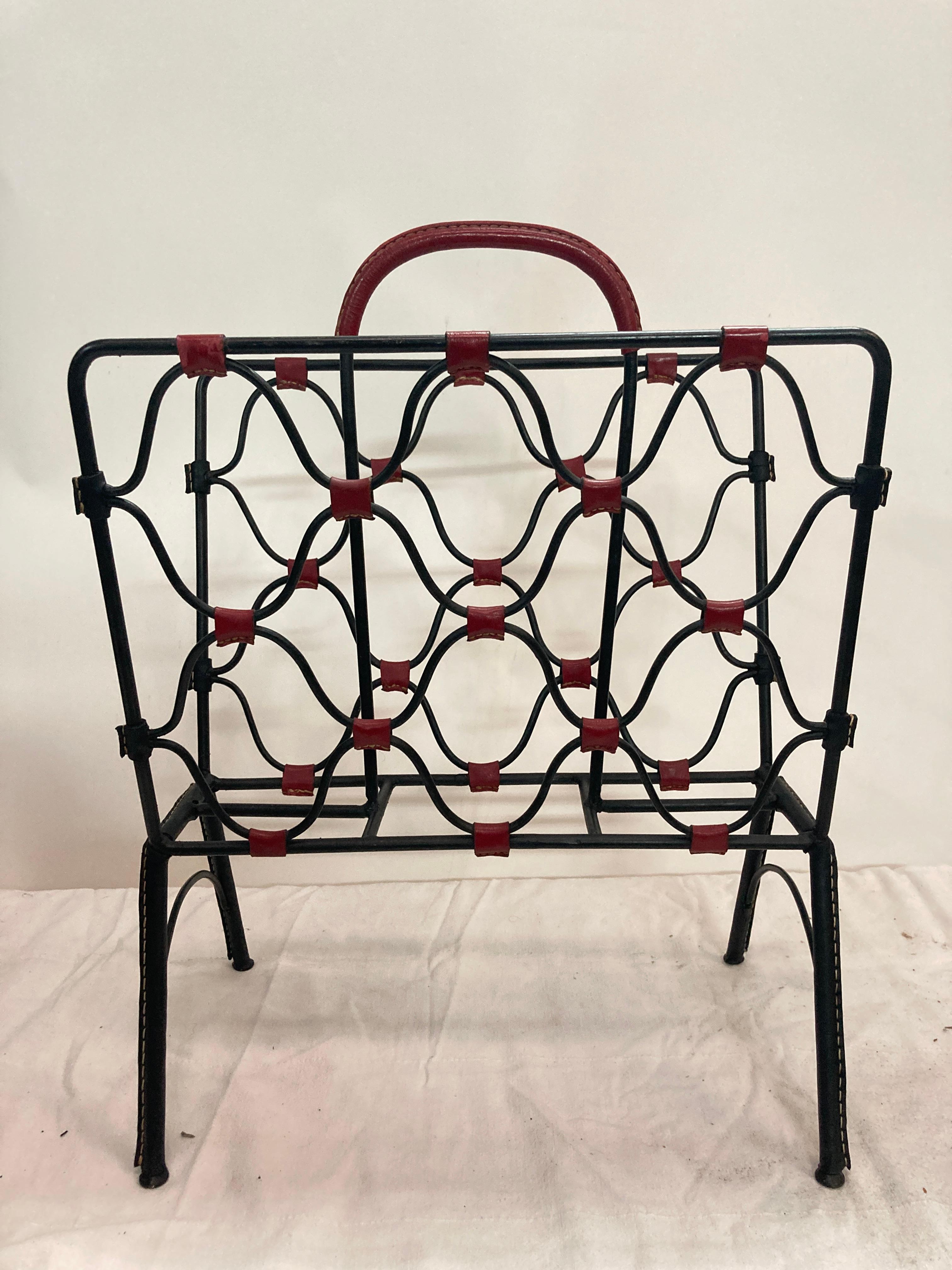 Metal 1950's stitched leather magazine rack by Jacques Adnet For Sale