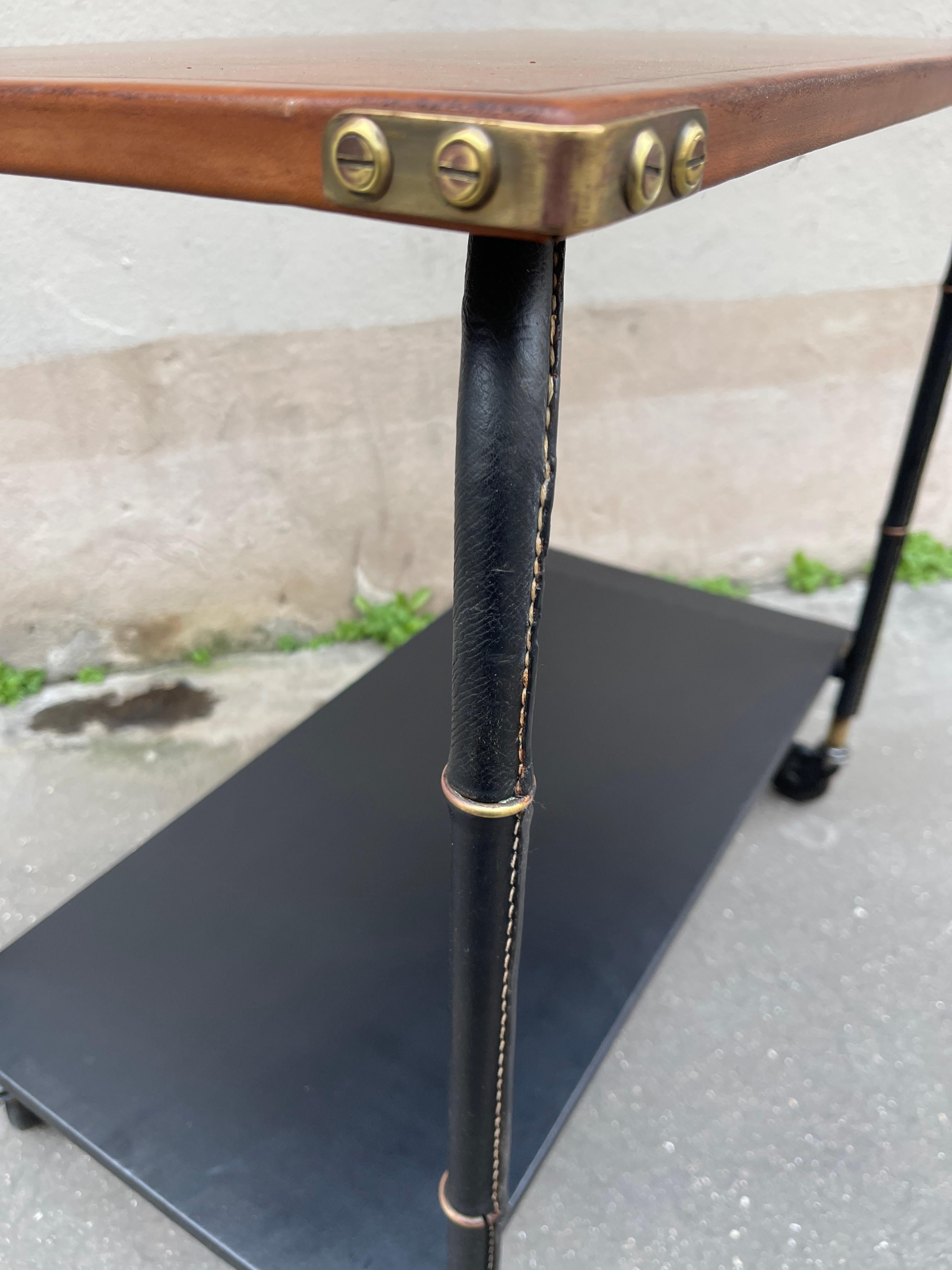 Mid-20th Century 1950's Stitched leather occasional table by Jacques Adnet For Sale