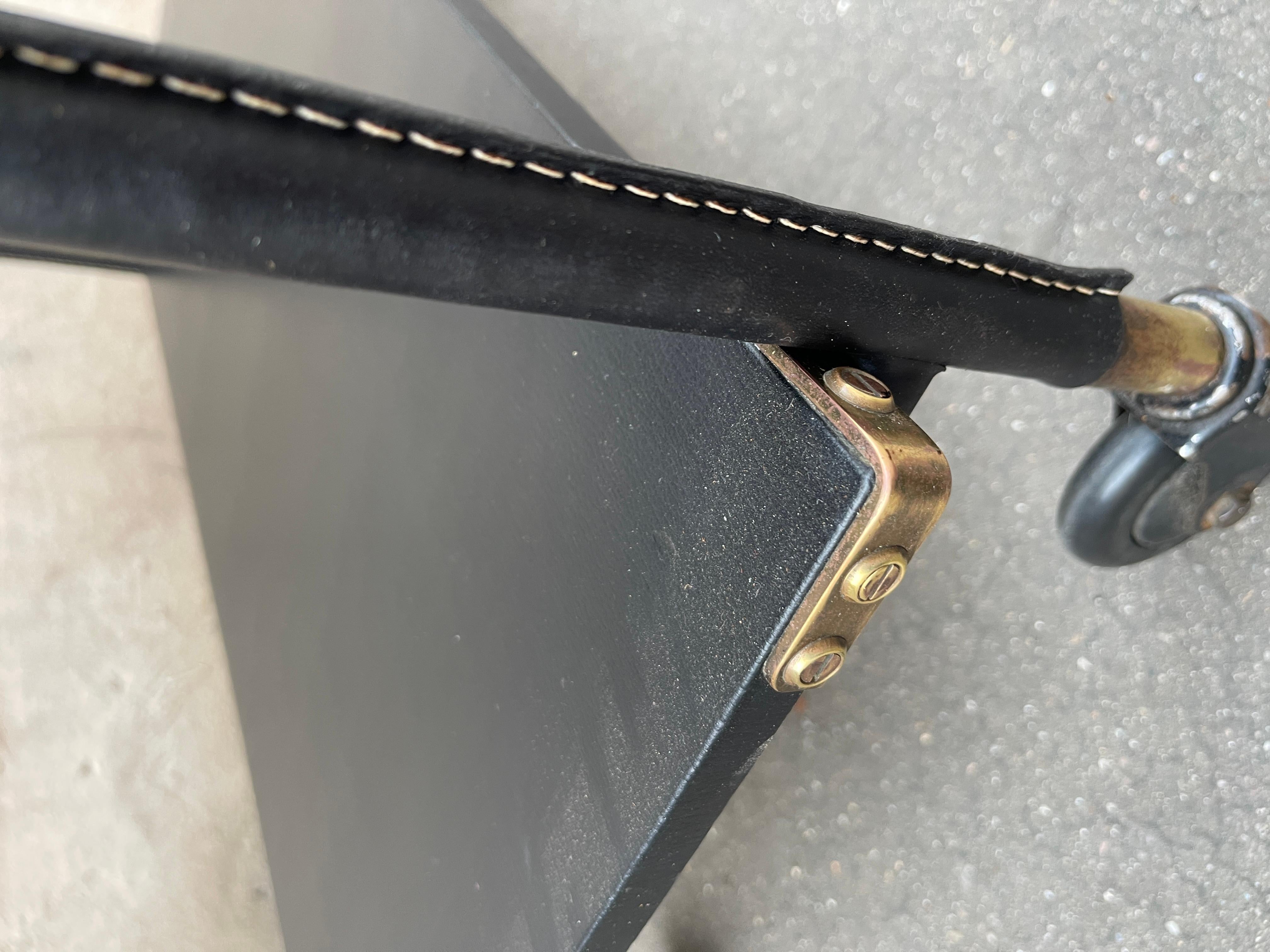 Brass 1950's Stitched leather occasional table by Jacques Adnet For Sale