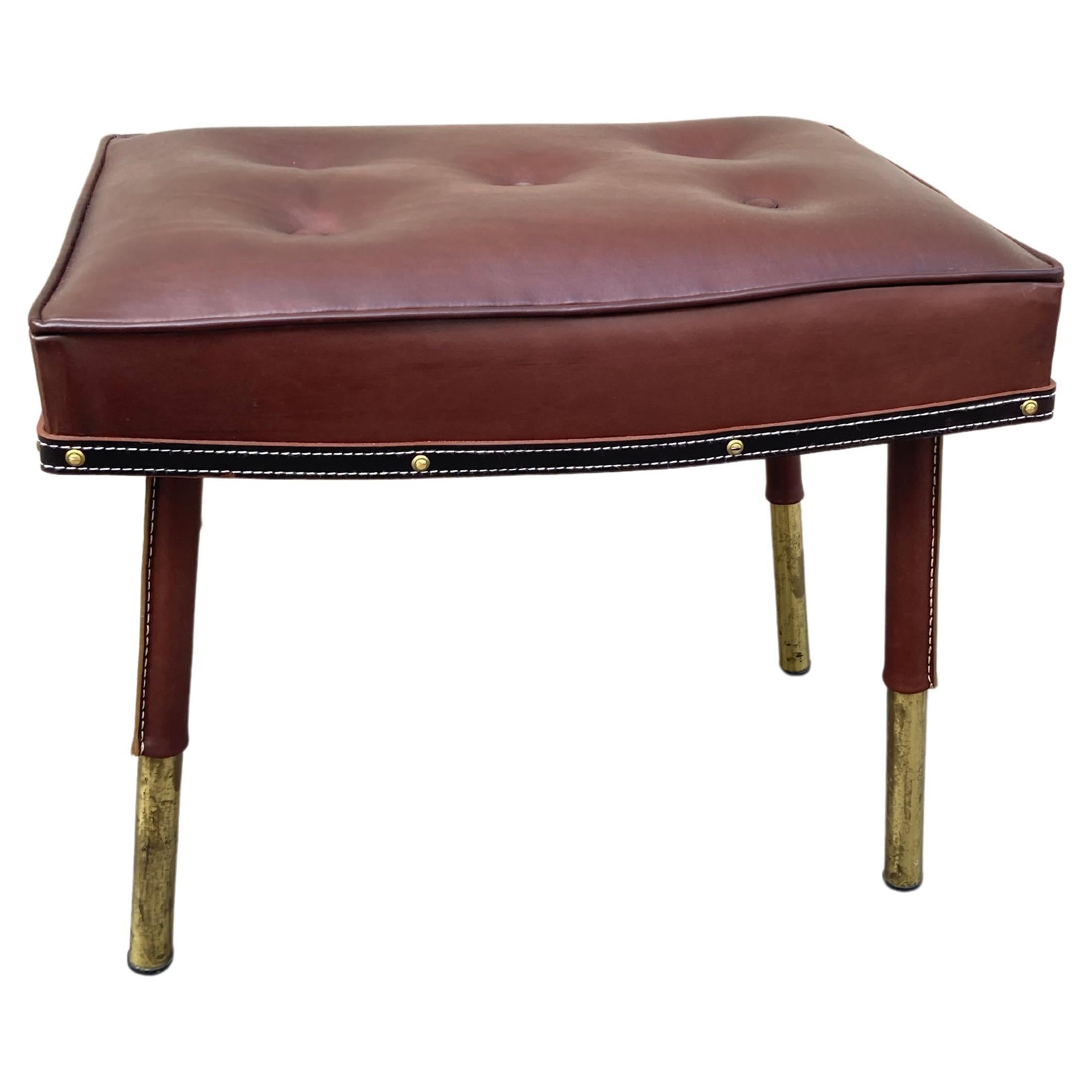 1950's Stitched leather ottoman by Jacques Adnet For Sale