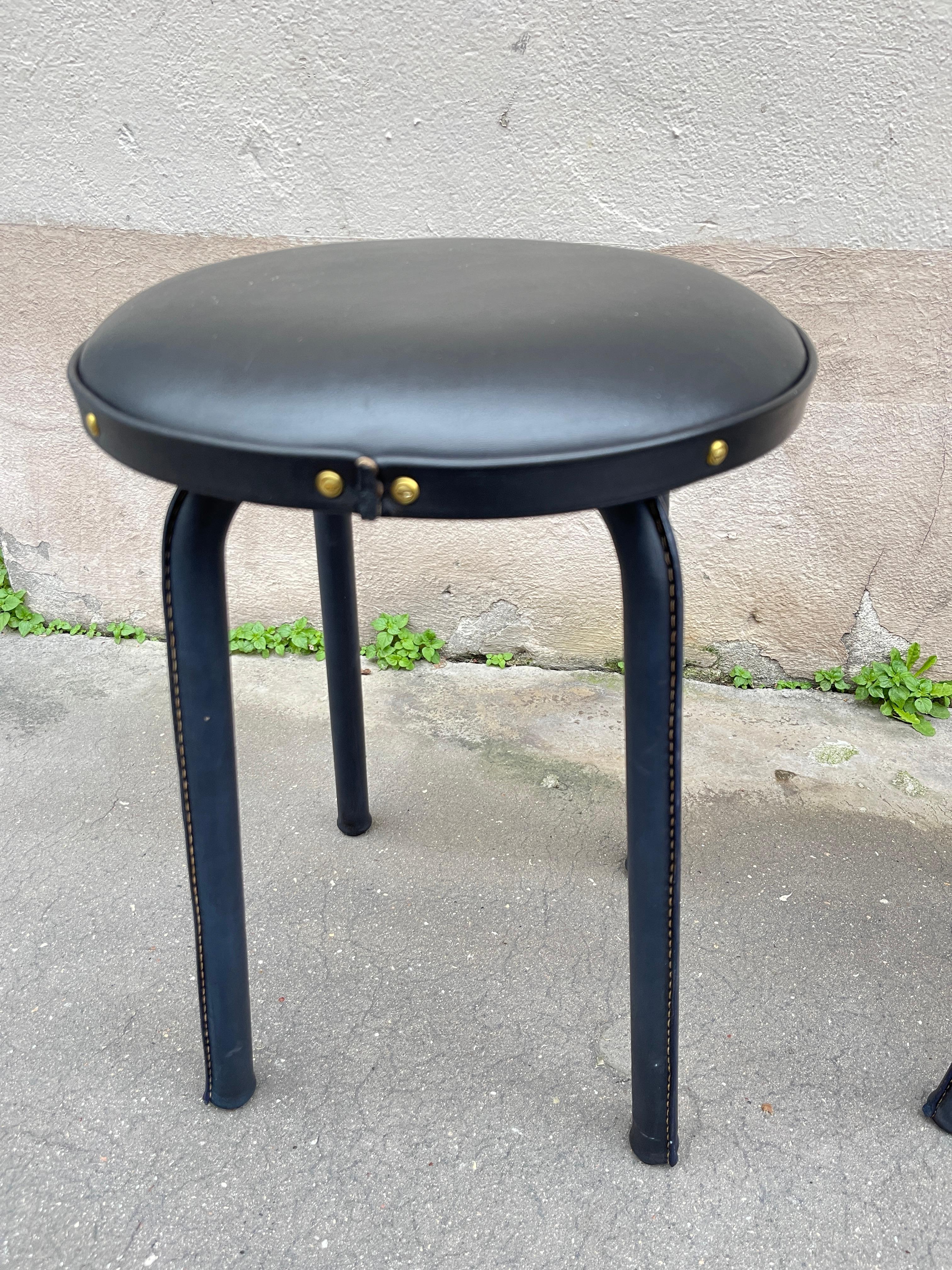 1950's Stitched leather pair of stools by Jacques Adnet
France