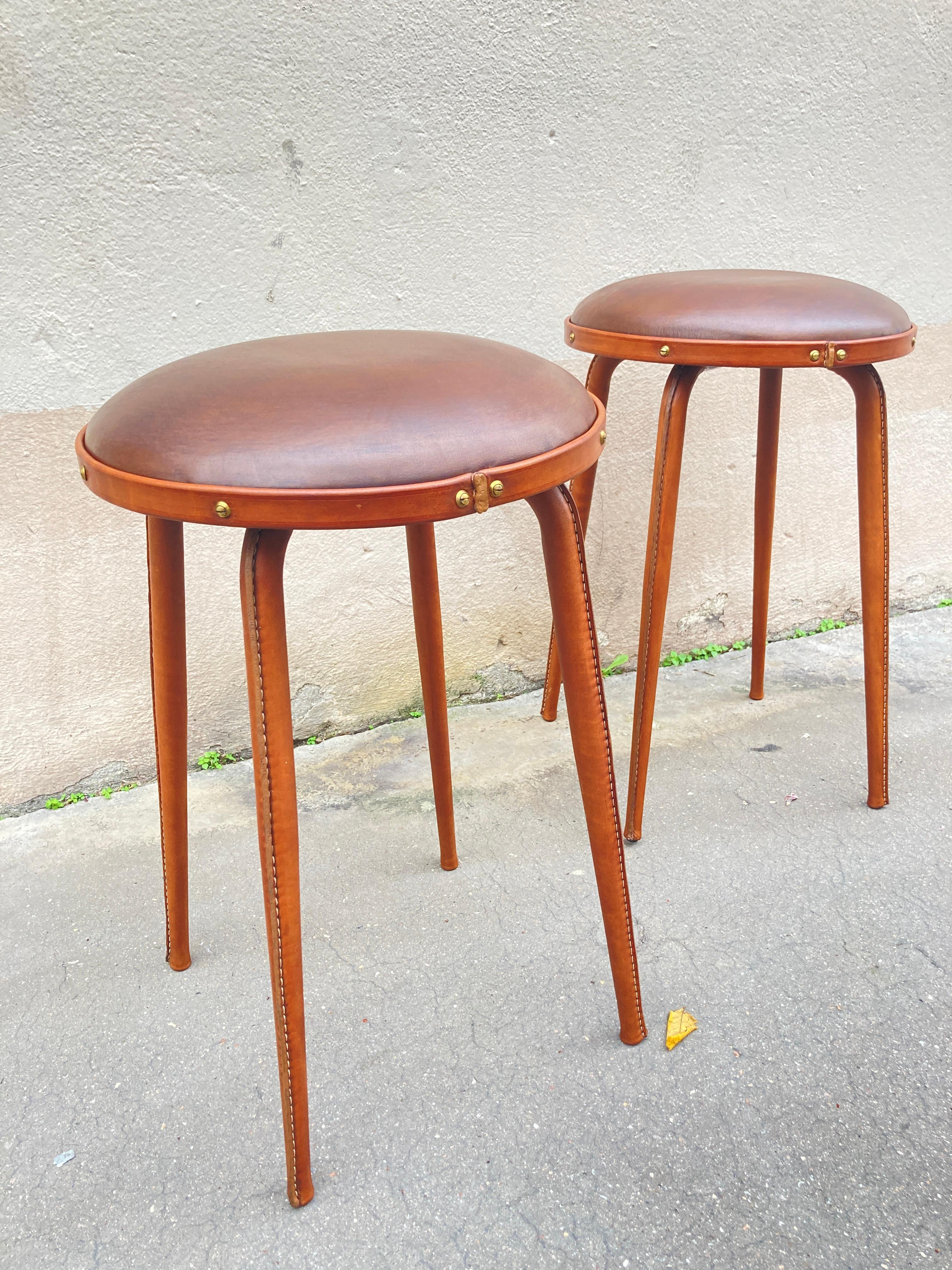 French 1950's Stitched Leather pair of stools by Jacques Adnet