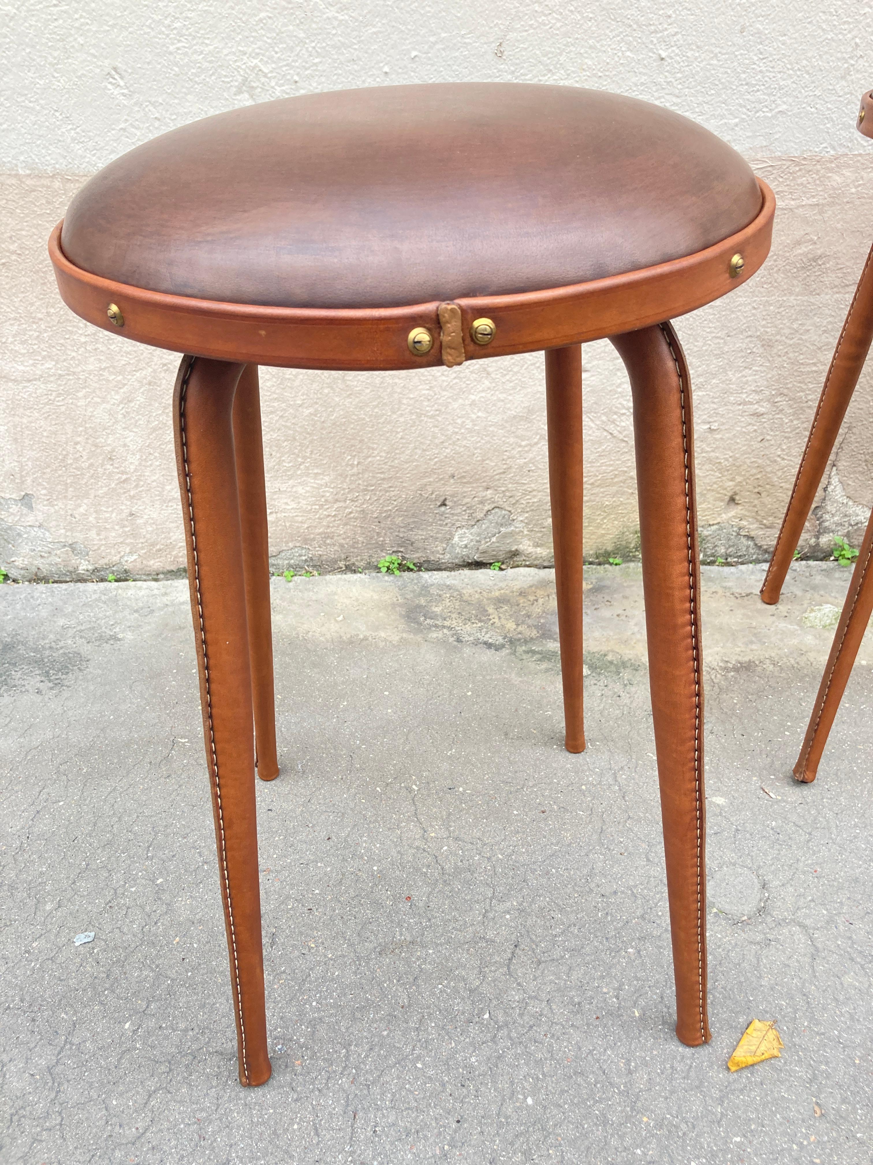 1950's Stitched Leather pair of stools by Jacques Adnet In Good Condition In New York, NY