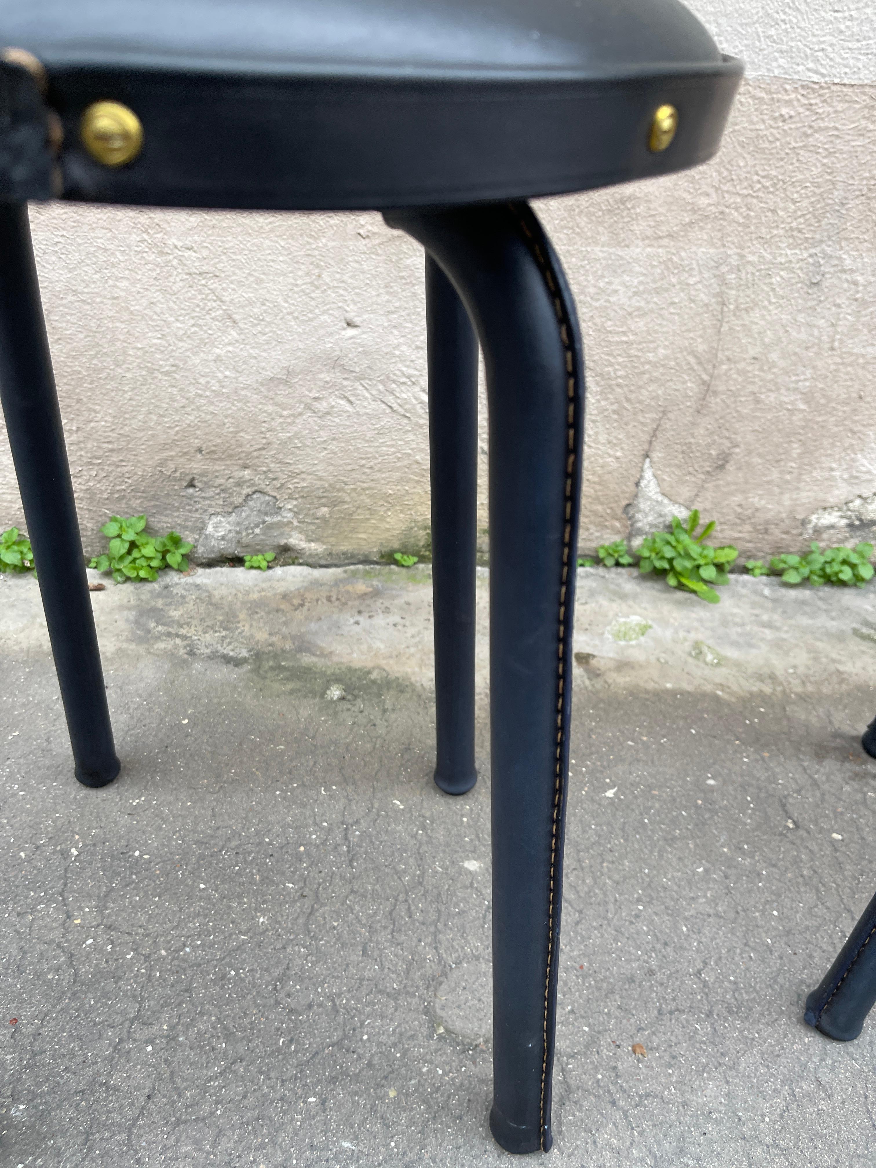 1950's Stitched leather pair of stools by Jacques Adnet In Good Condition For Sale In New York, NY