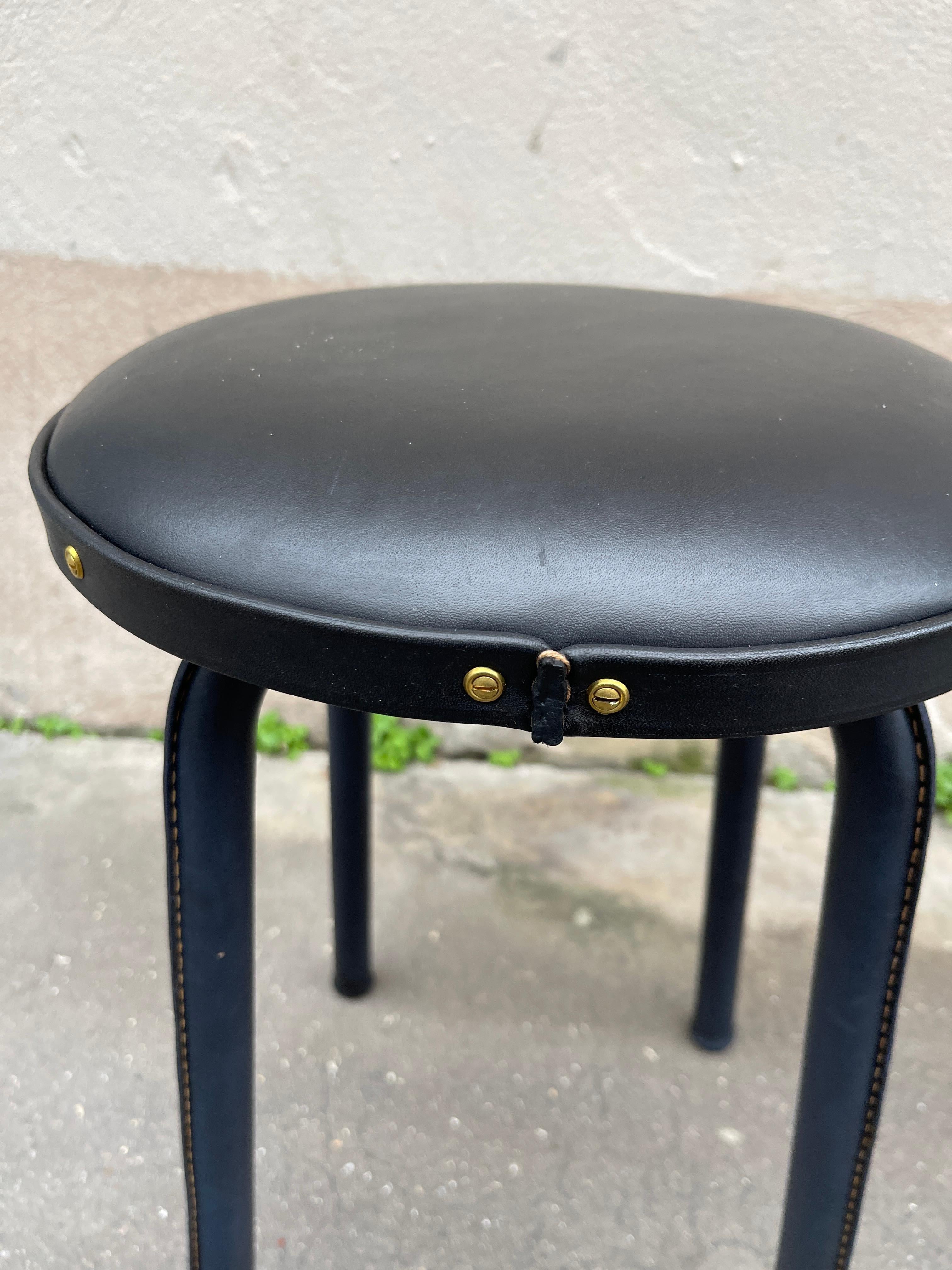 Mid-20th Century 1950's Stitched leather pair of stools by Jacques Adnet For Sale