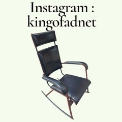 1950's Stitched leather rocking chair by Jacques Adnet