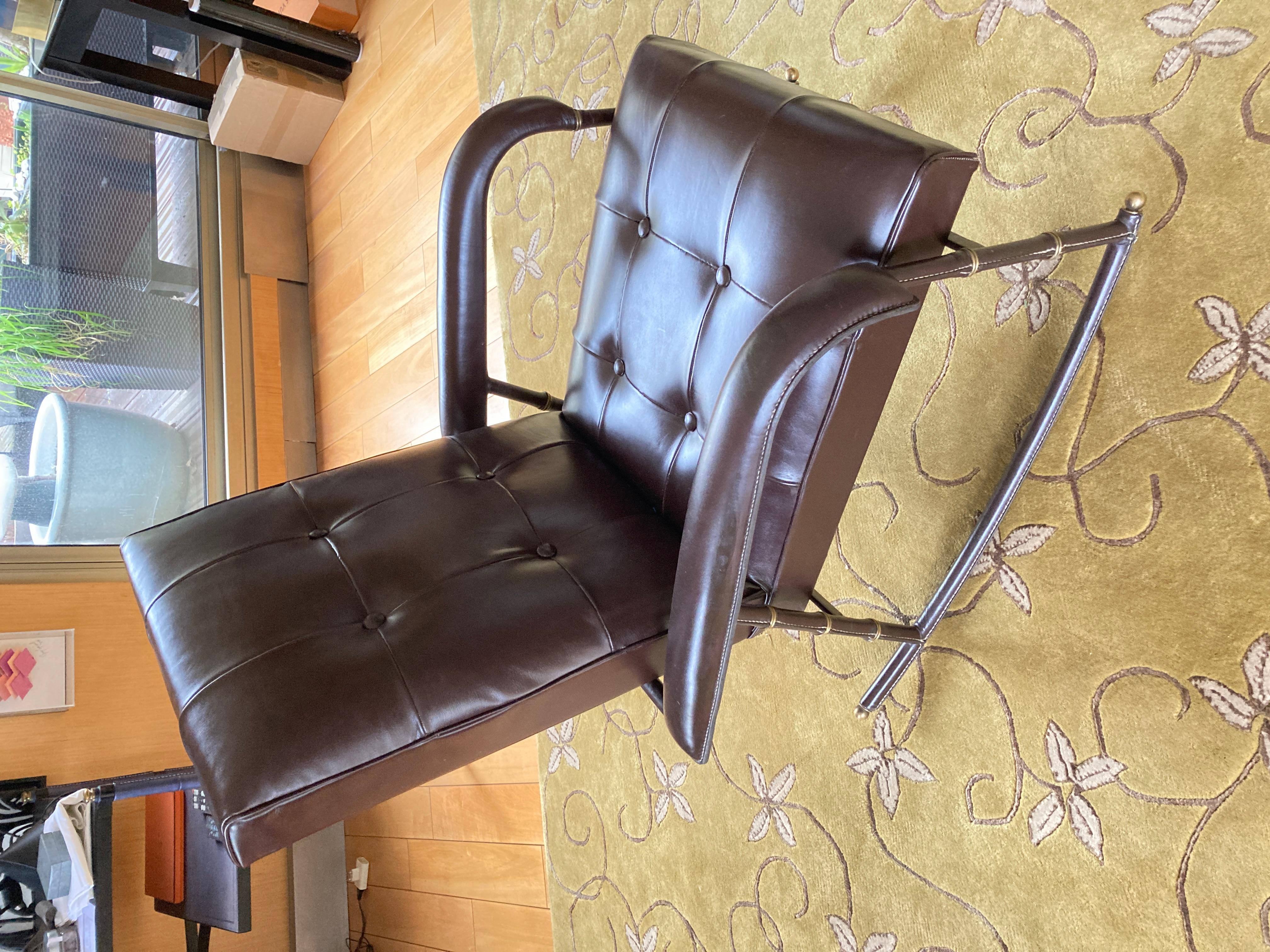 French 1950's Stitched leather Rocking chair by Jacques Adnet For Sale