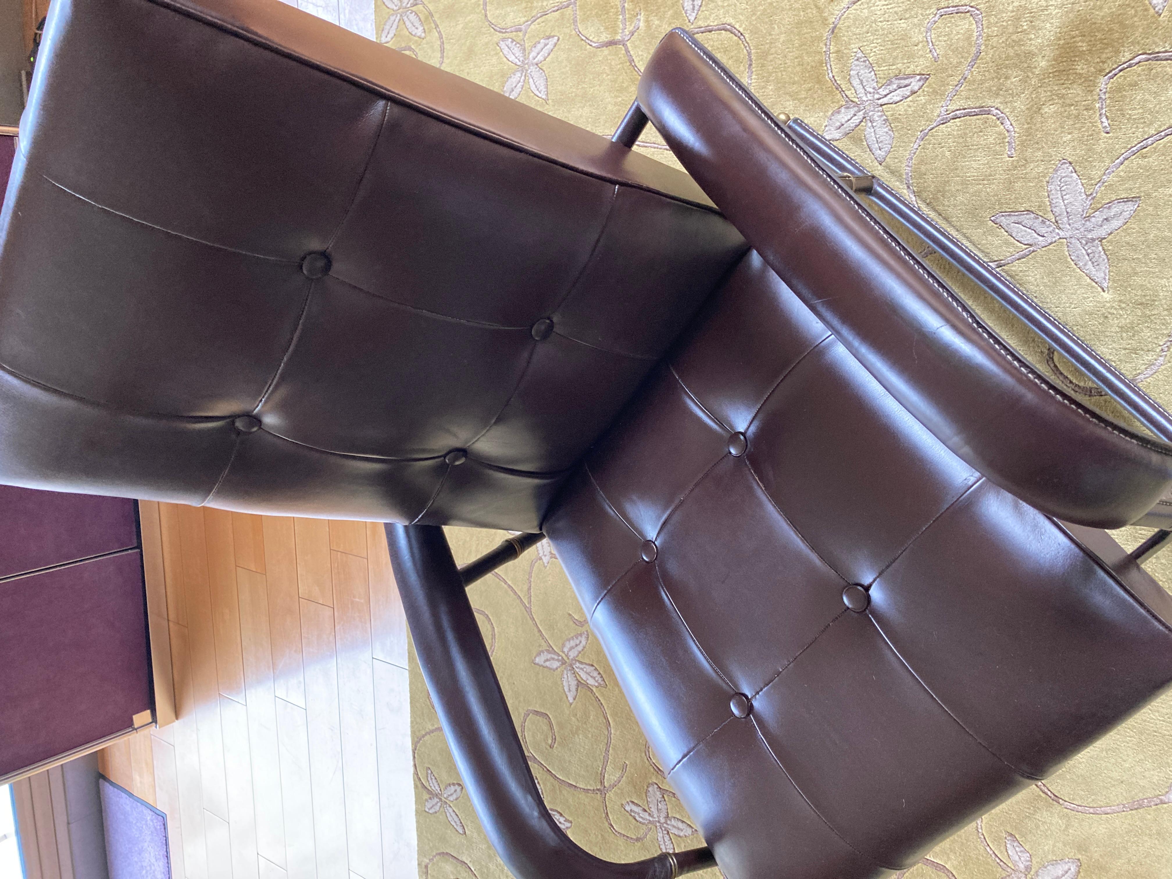 Bronze 1950's Stitched leather Rocking chair by Jacques Adnet For Sale