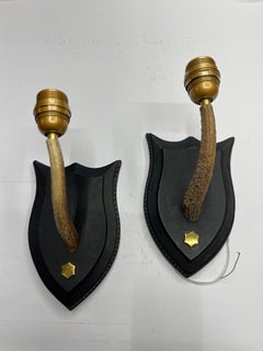 1950's Stitched leather sconces by Jacques Adnet