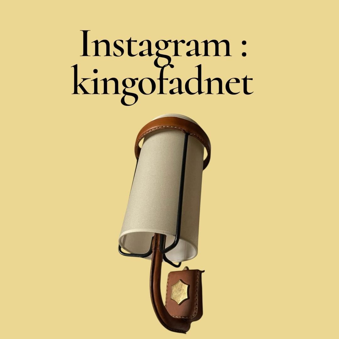 1950's Stitched leather sconces by Jacques Adnet Francés en venta