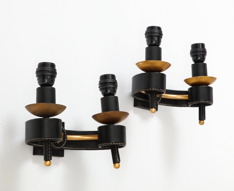Mid-20th Century 1950's Stitched leather sconces by Jacques Adnet For Sale