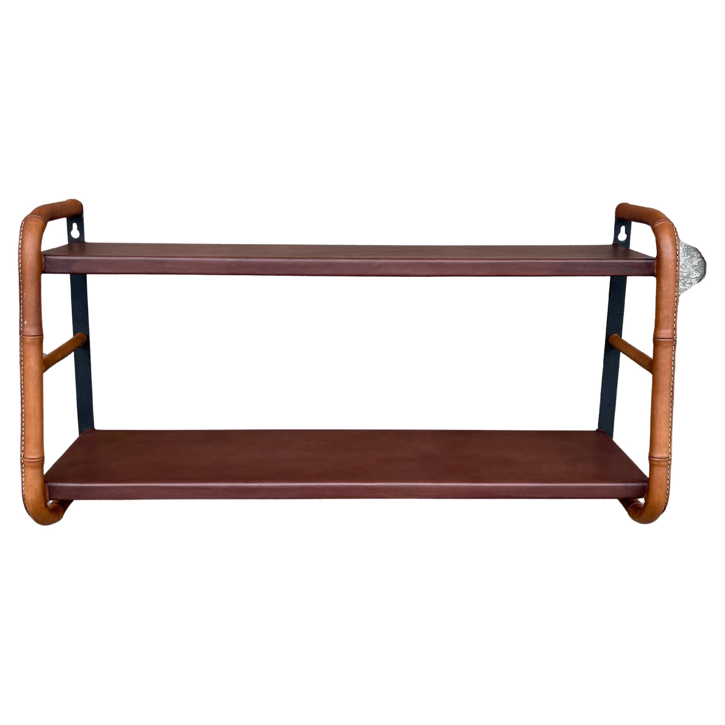 1950's Stitched Leather shelve by Jacques Adnet