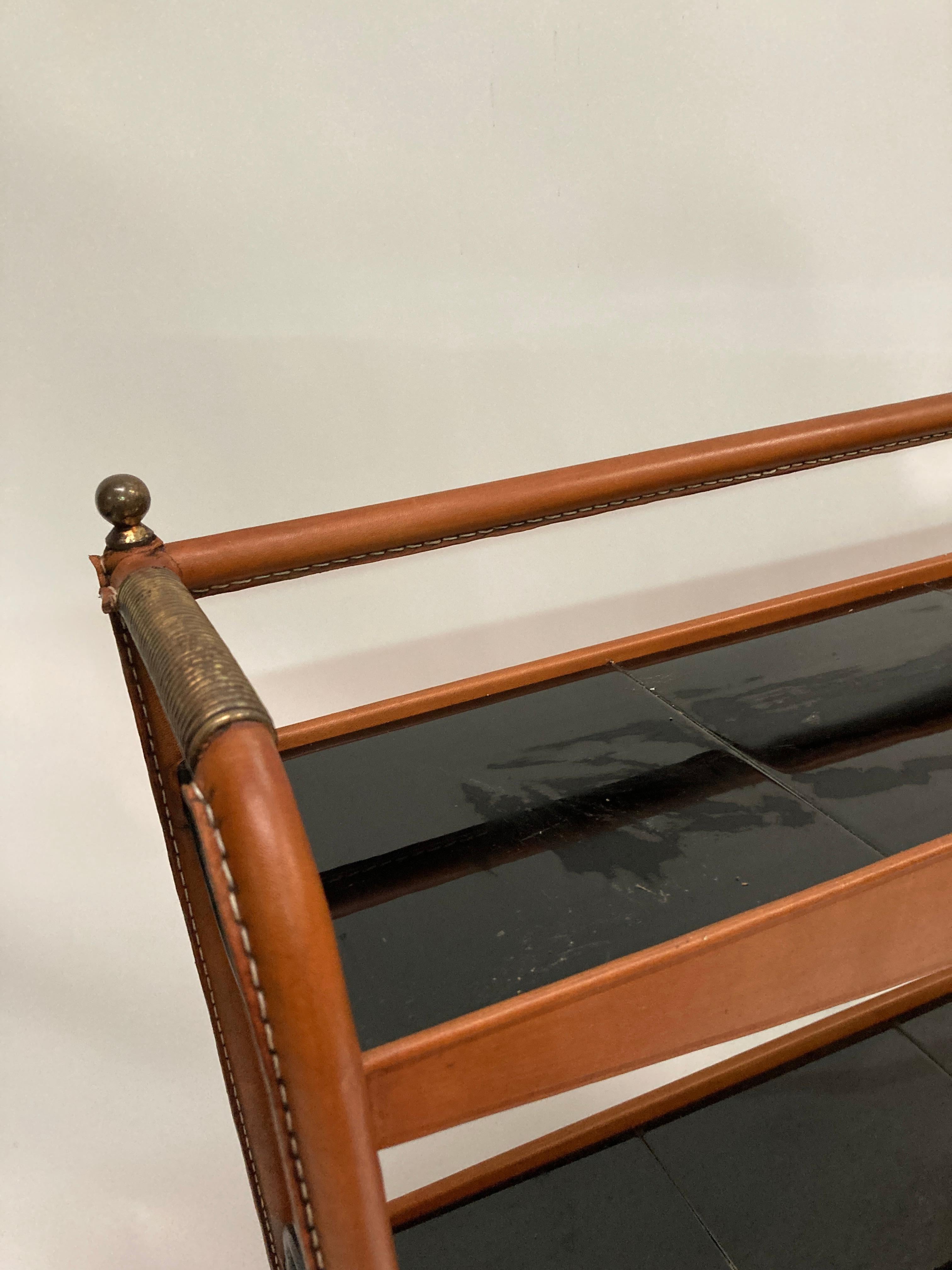 Metal 1950's Stitched Leather shelves by Jacques Adnet For Sale