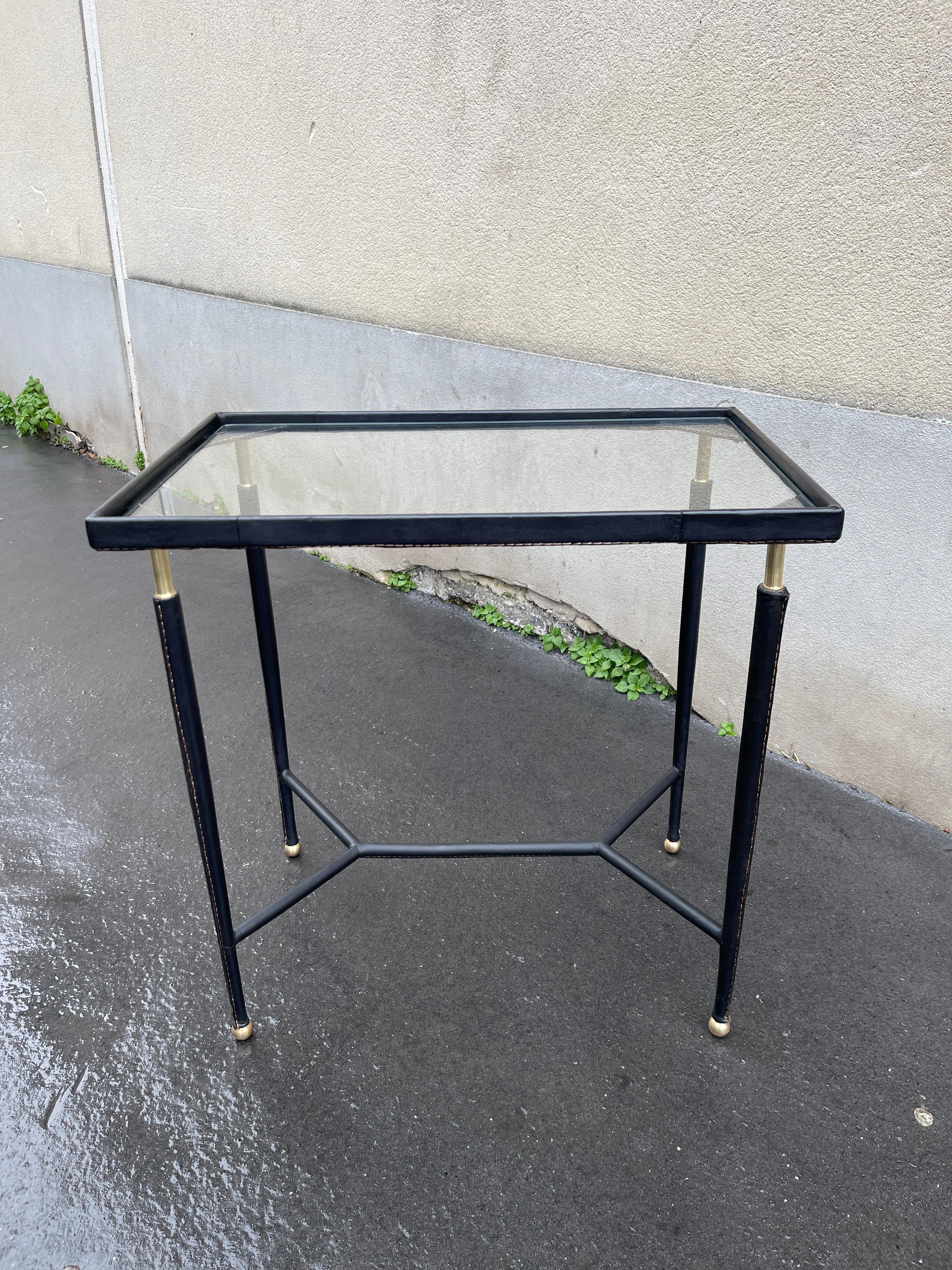 1950's Stitched leather side table by Jules Leleu
Designed for trans-atlantique ships as 