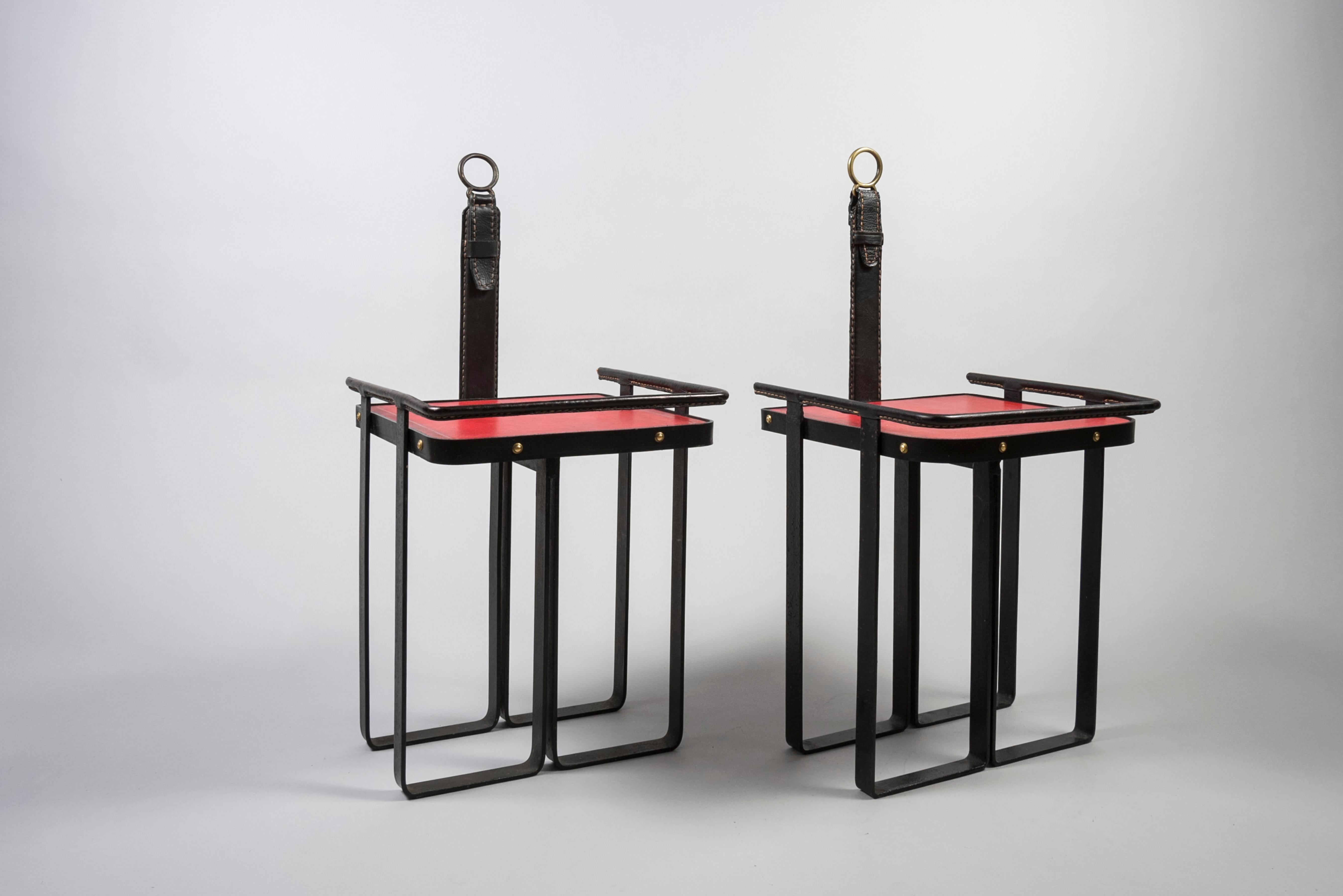 1950's stitched leather side tables by Jacques Adnet
Rare in this combination of colors.
 