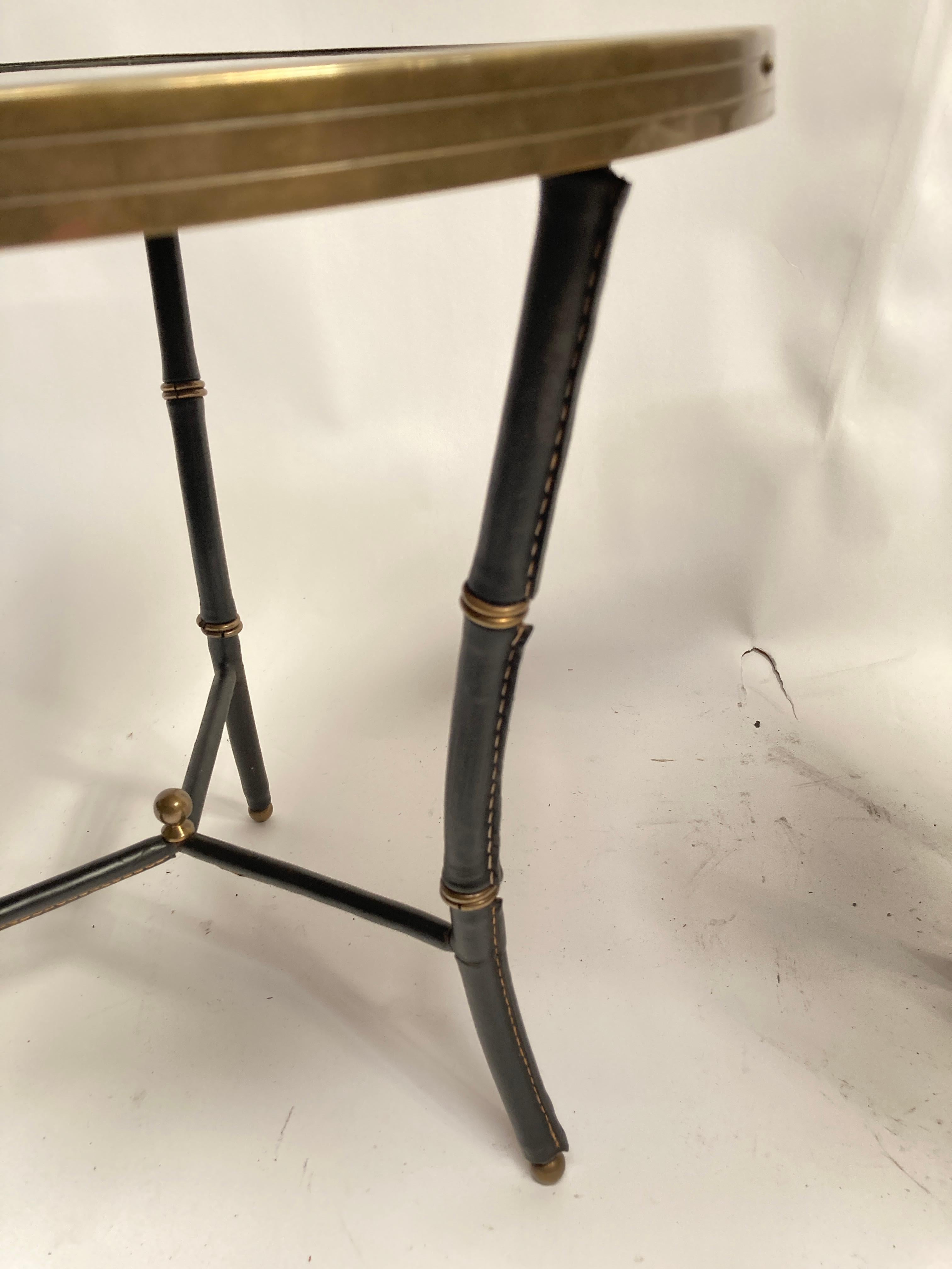 Brass 1950's Stitched leather side tables by Jacques Adnet For Sale